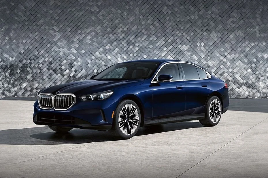 A dark blue BMW 5 Series
