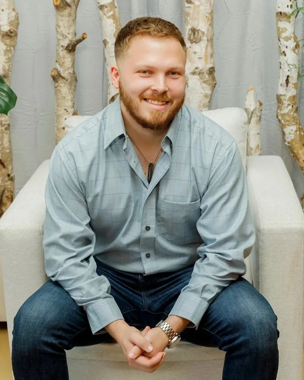 Matthew Rabe, founder of Kingdom Training, seated in a light blue shirt - mindset and identity coach for business owners and leaders.