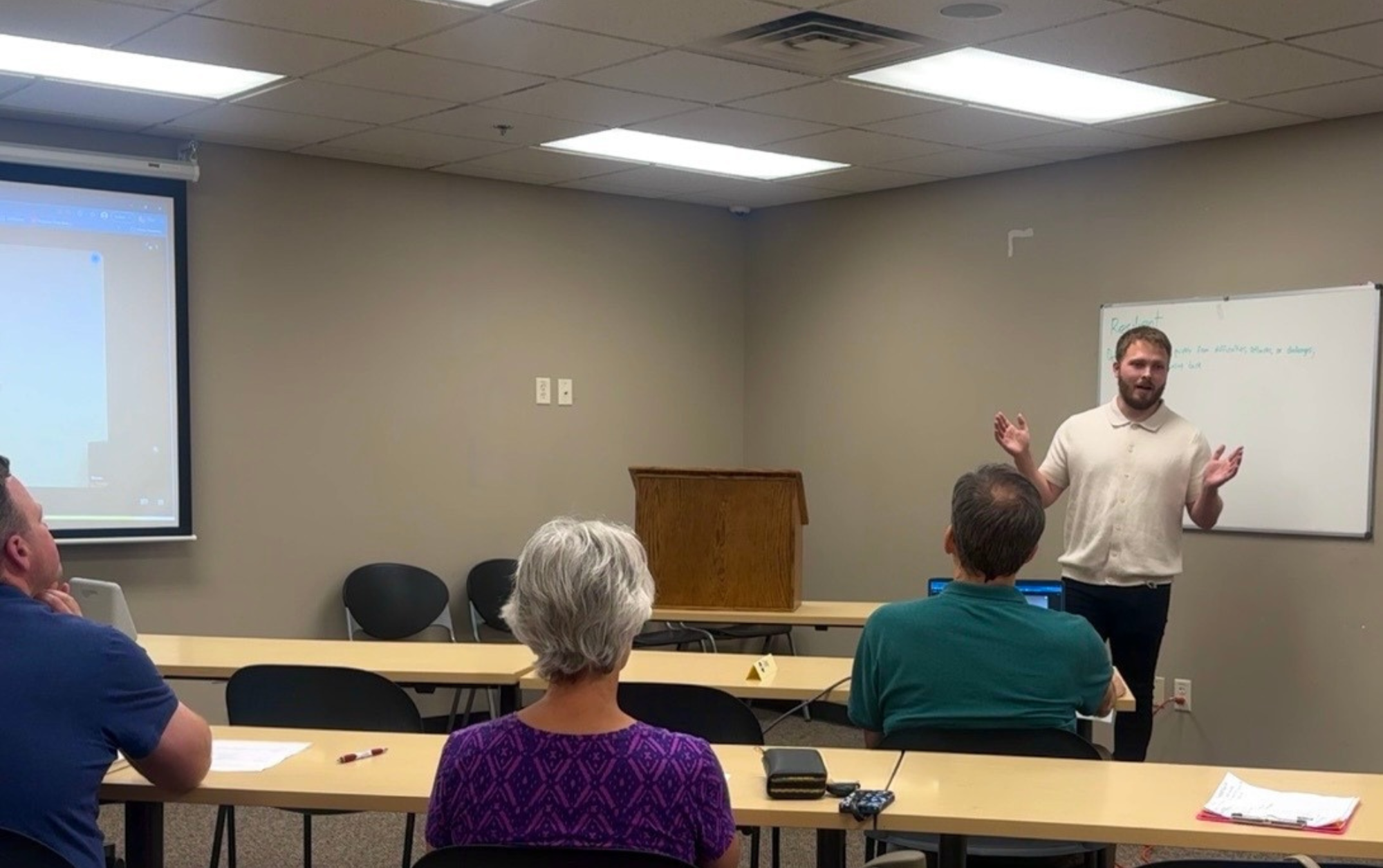 Matthew Rabe, founder of Kingdom Training giving a talk to group of people wanting to improve their public speaking skills