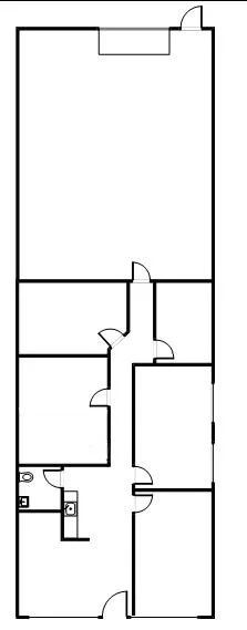 A black-and-white floor plan of a commercial space with multiple rooms and doorways, showing the layout of the interior space.