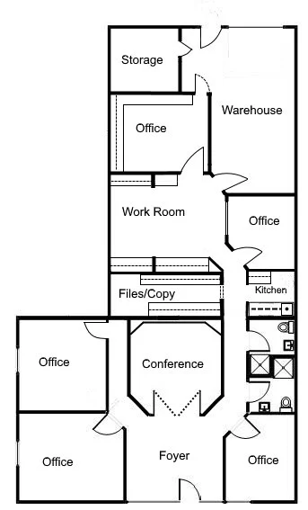 Floor plan of an office building with rooms labeled Storage, Warehouse, Office, Work Room, Files/Copy, Conference, Foyer, Kitchen, and restrooms.