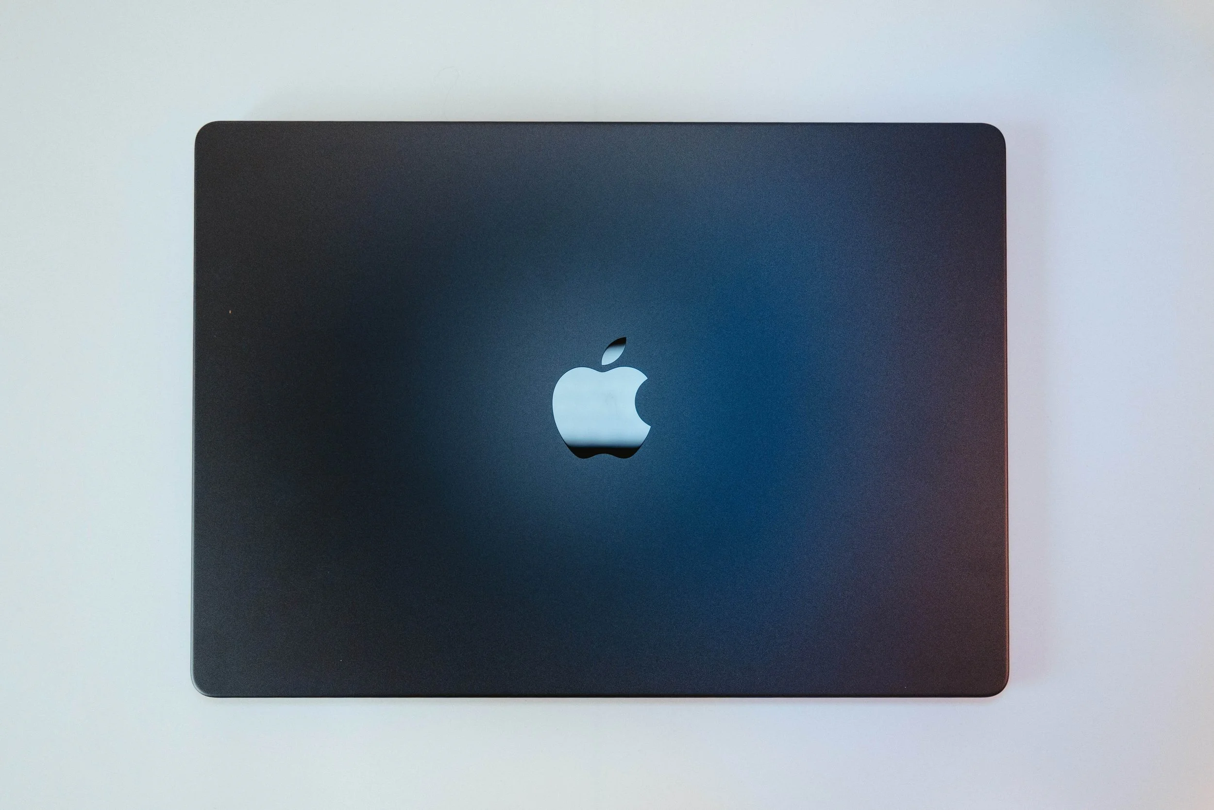 Apple MacBook laptop used for social media management, editing, and content creation by Svanna Andrada Studios.