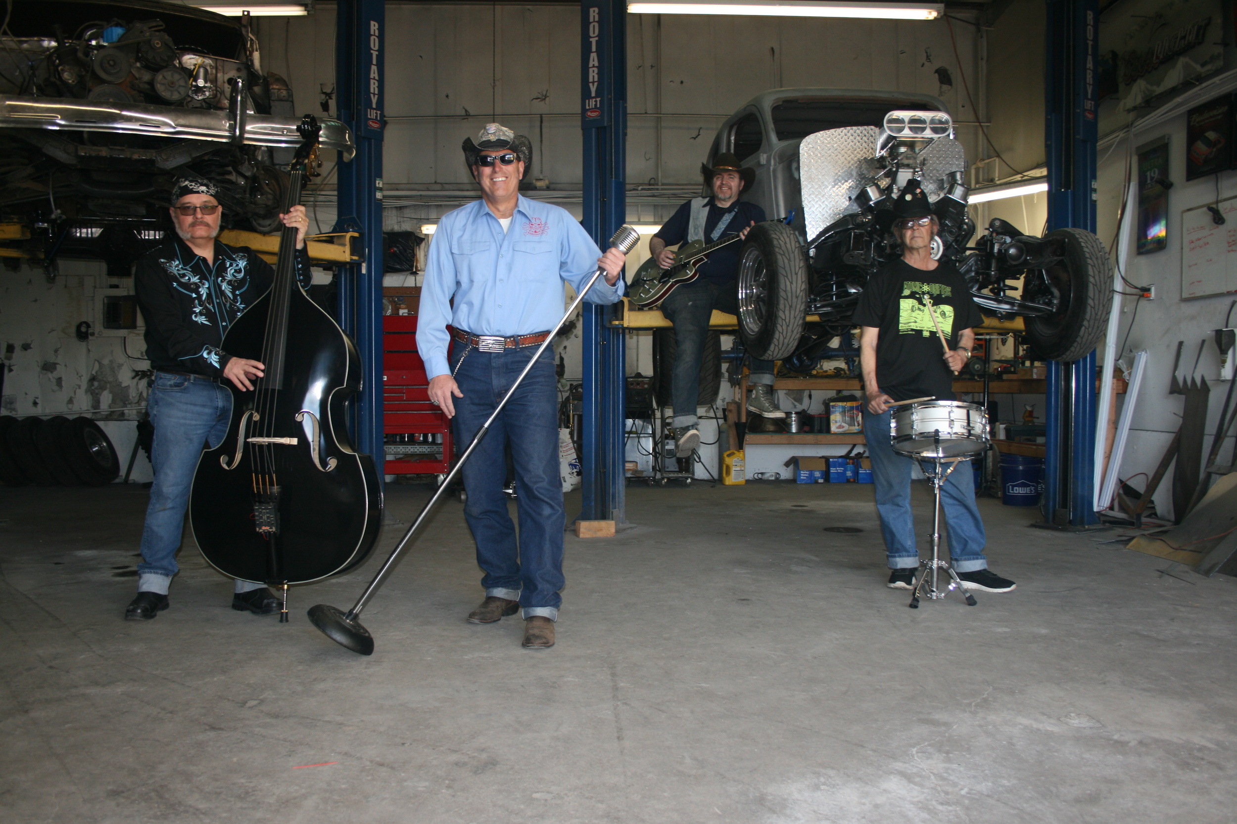 BAND PROMO MARCH 2021 JOHN ON LIFT (1).png