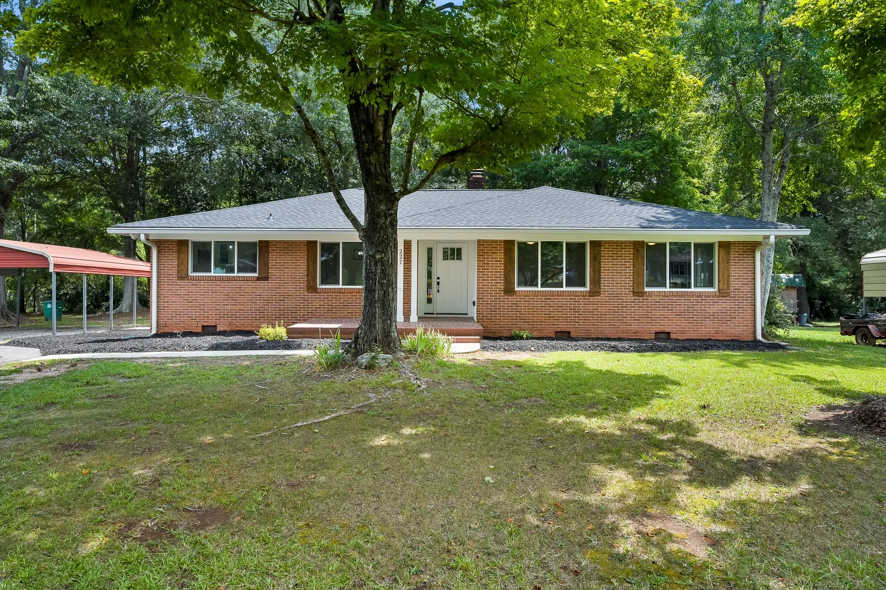 Front exterior of renovated brick ranch at 227 Belton Dr in Williamston SC