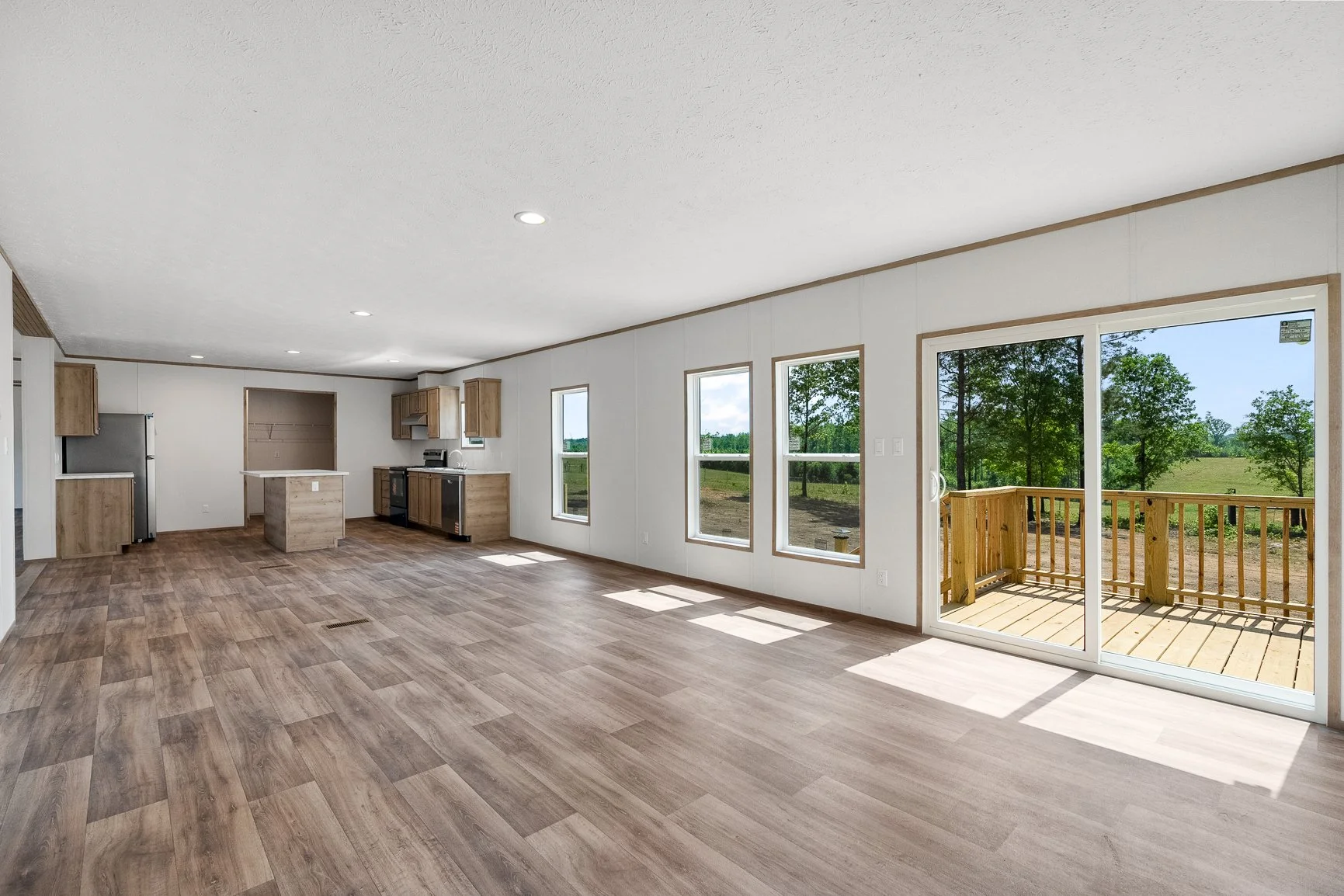 919 Rector Rd Belton SC den livingroom dining room and kitchen