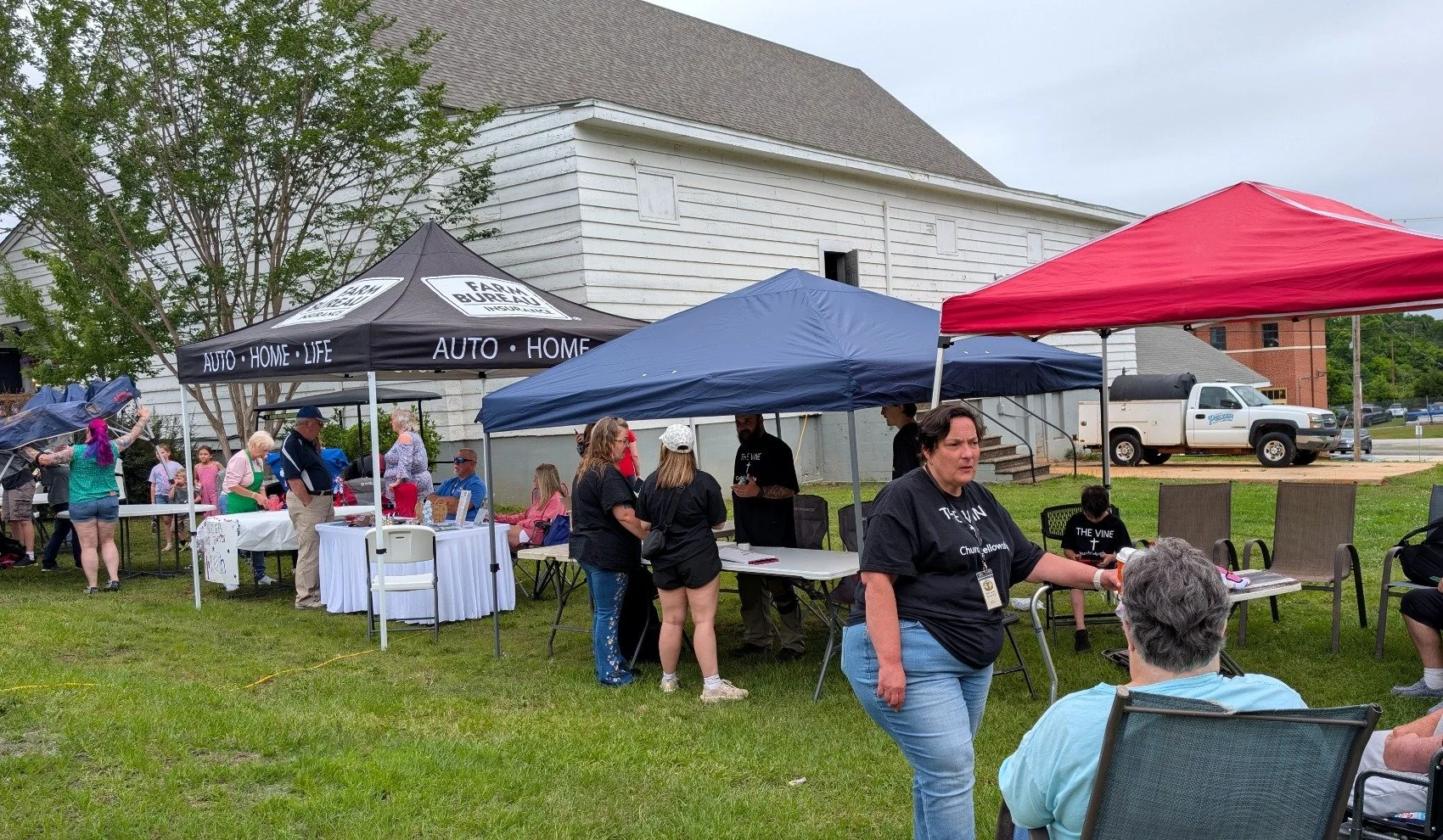 Community gathering near the historic Pelzer Gym in Pelzer, South Carolina.