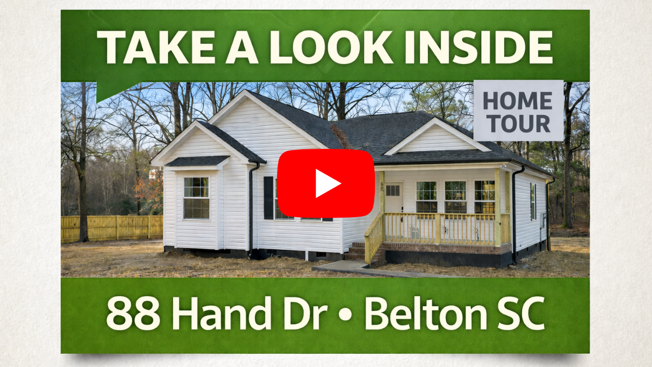 photo of front of house link to youtube video