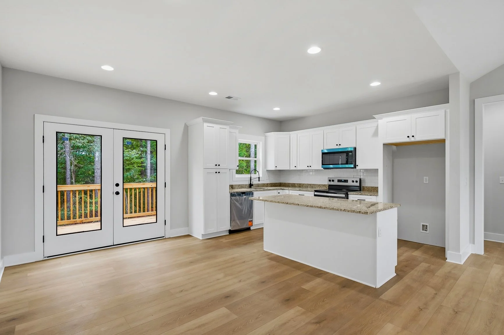 Kitchen with island and extra seating