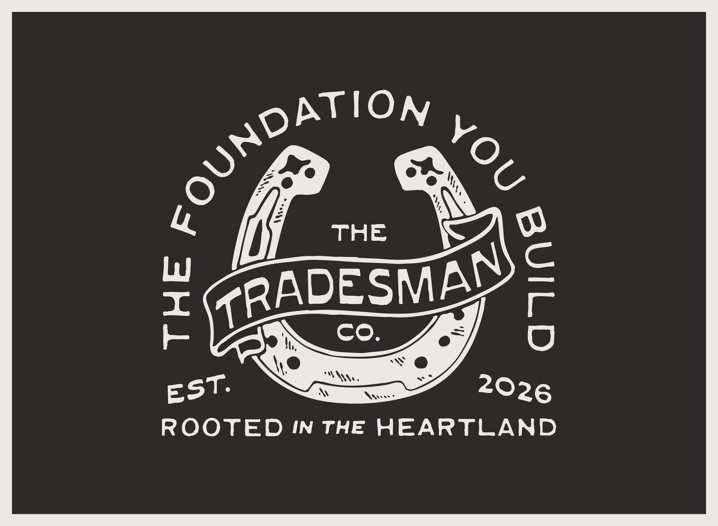 Logo for The Tradesman Co. featuring two hammer heads crossing a horseshoe, with text around and beneath it, including establishment year 2026 and tagline 'Rooted in the Heartland'.