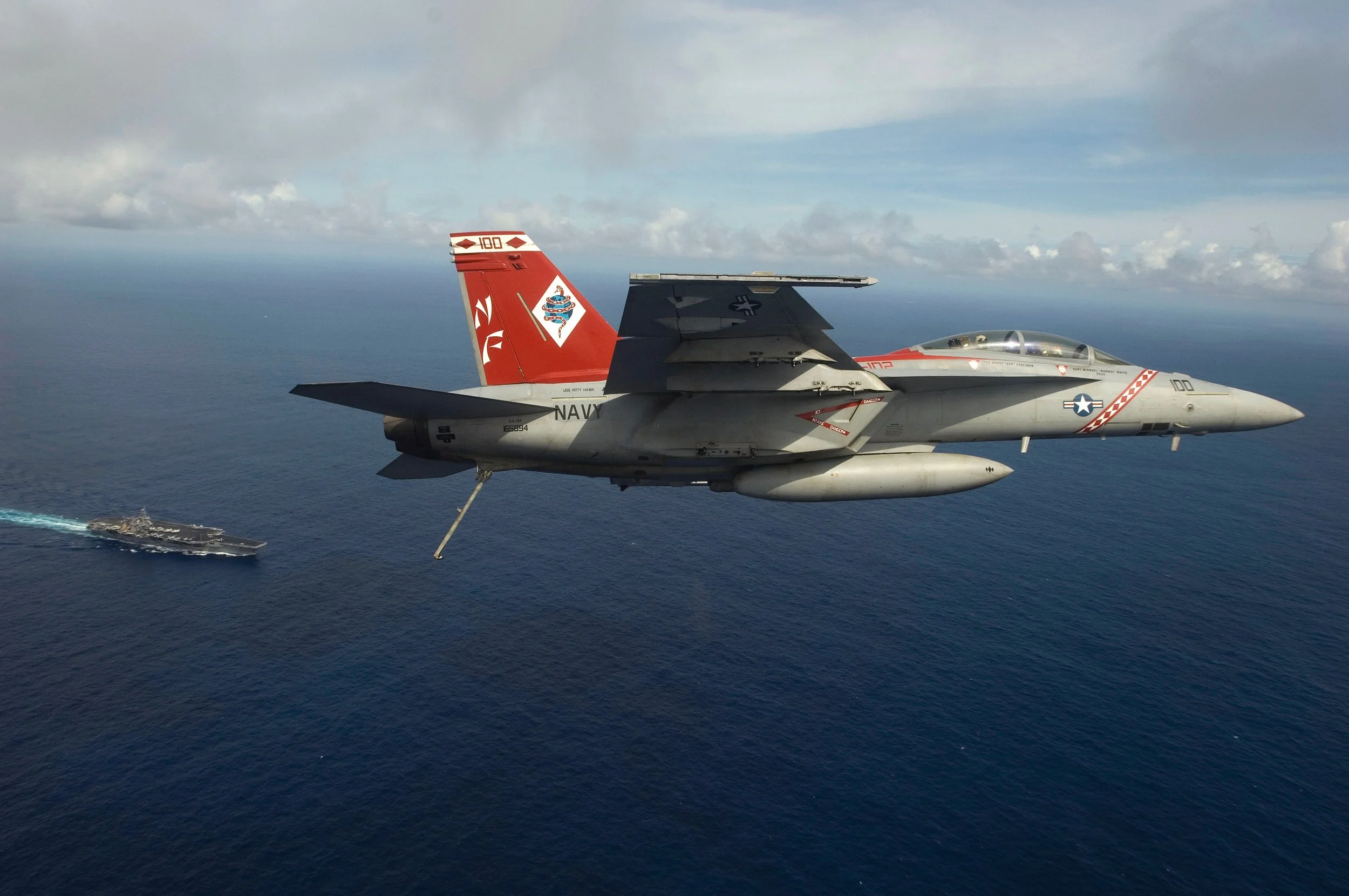 VFA-102 Super Hornet flying over USS Kittyhawk prior to a carrier landing