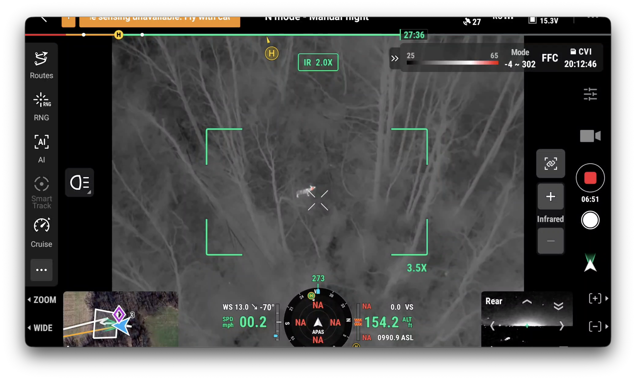 A drone camera view focusing on a wooded area with trees, showing night vision with infrared mode enabled, and various drone telemetry data displayed on the screen.