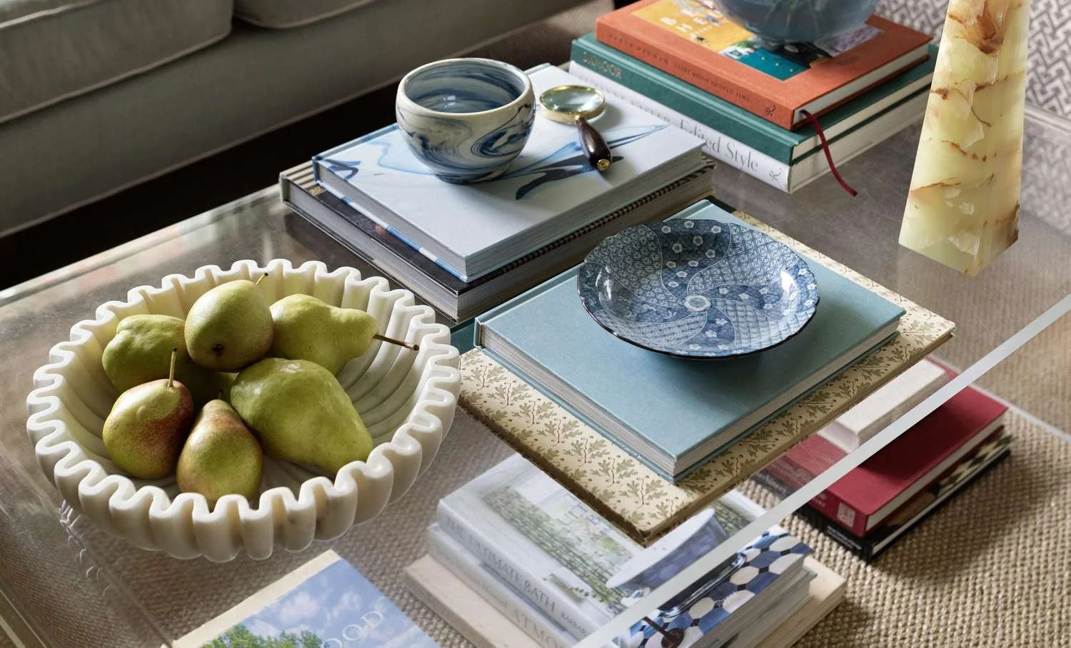 How To Arrange And Style Coffee Table Books, According To Interior Designers