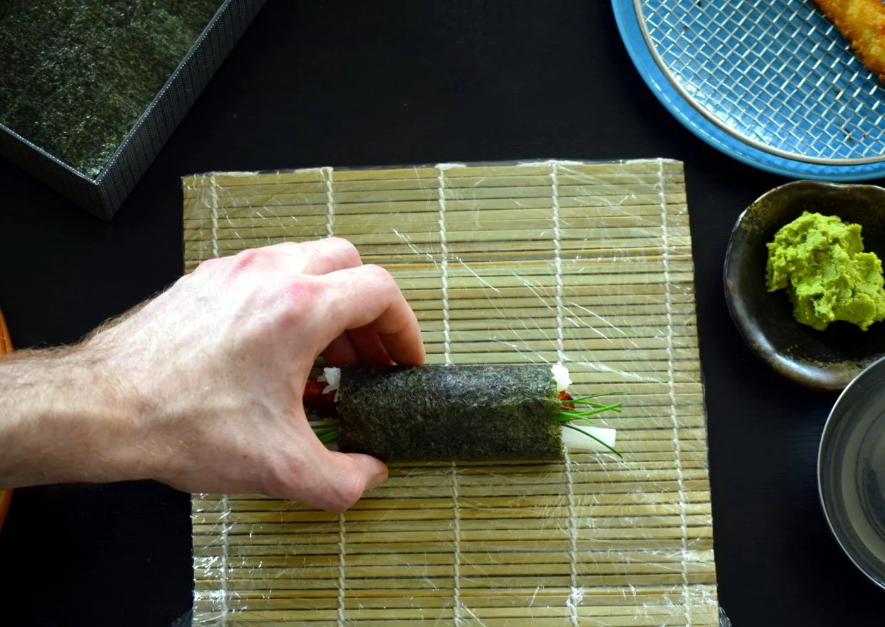 Bring the sushi back to the center, ready for the second roll