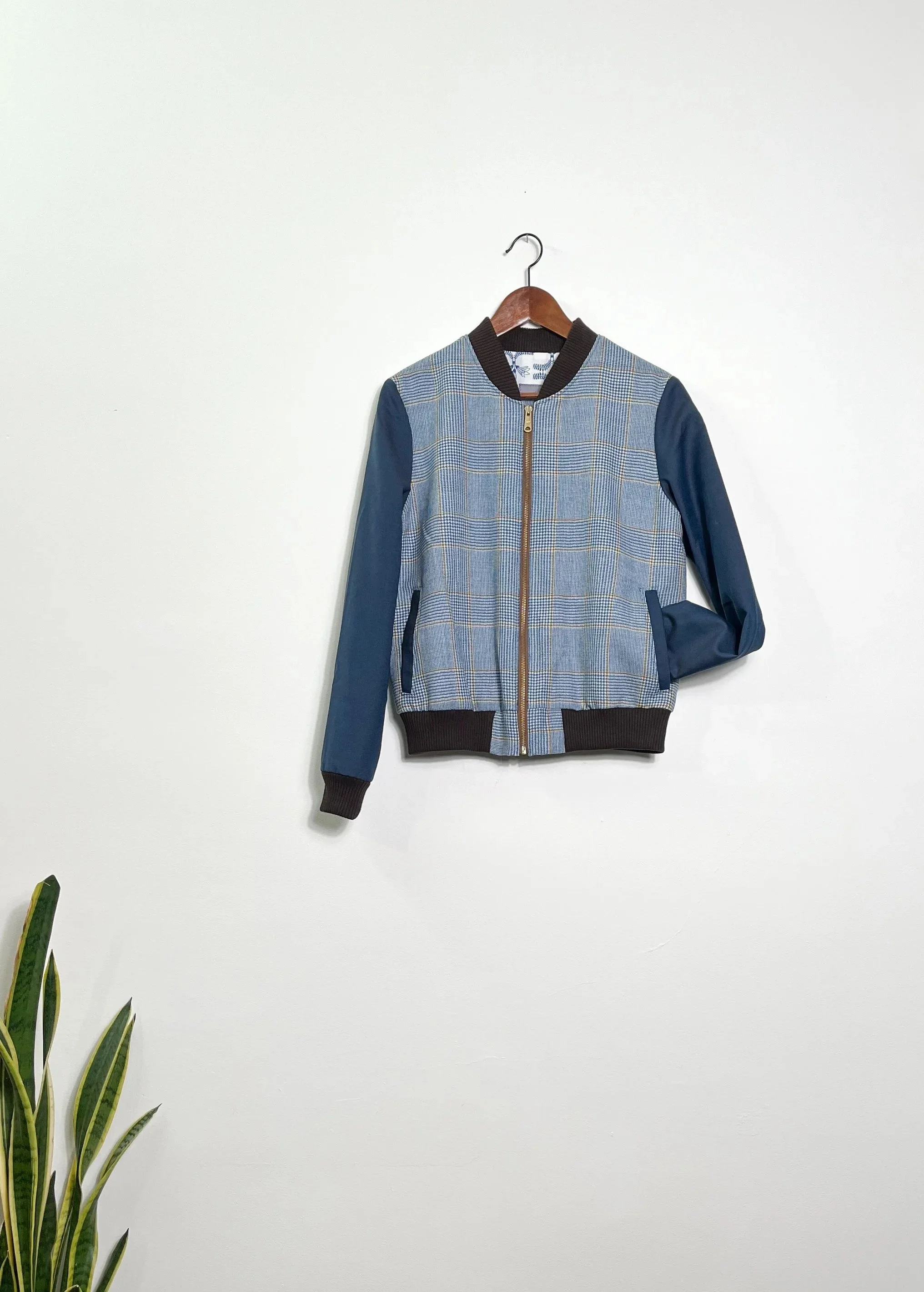 CipollaBomberJacket_BluChocPlaid_WallSleeve.jpg