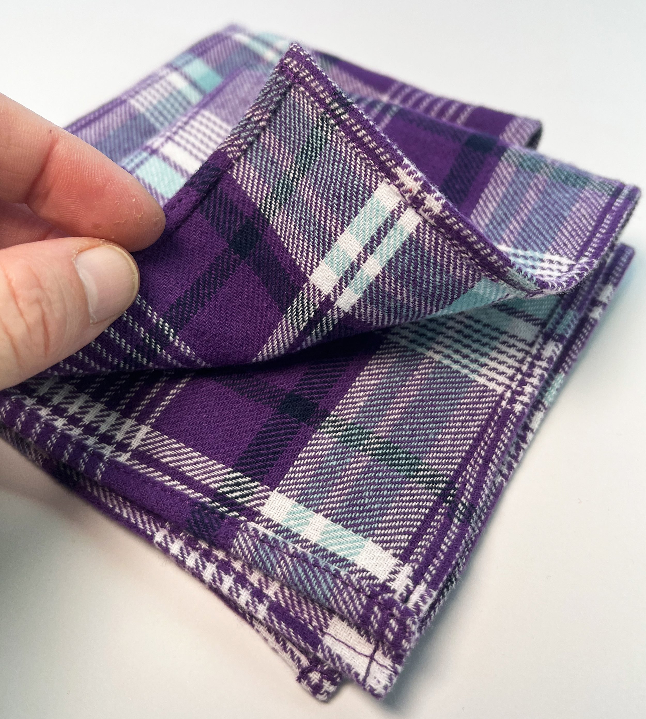 CipollaHanky_MINIS_CottonPlaid_Eggplant_hand.jpg