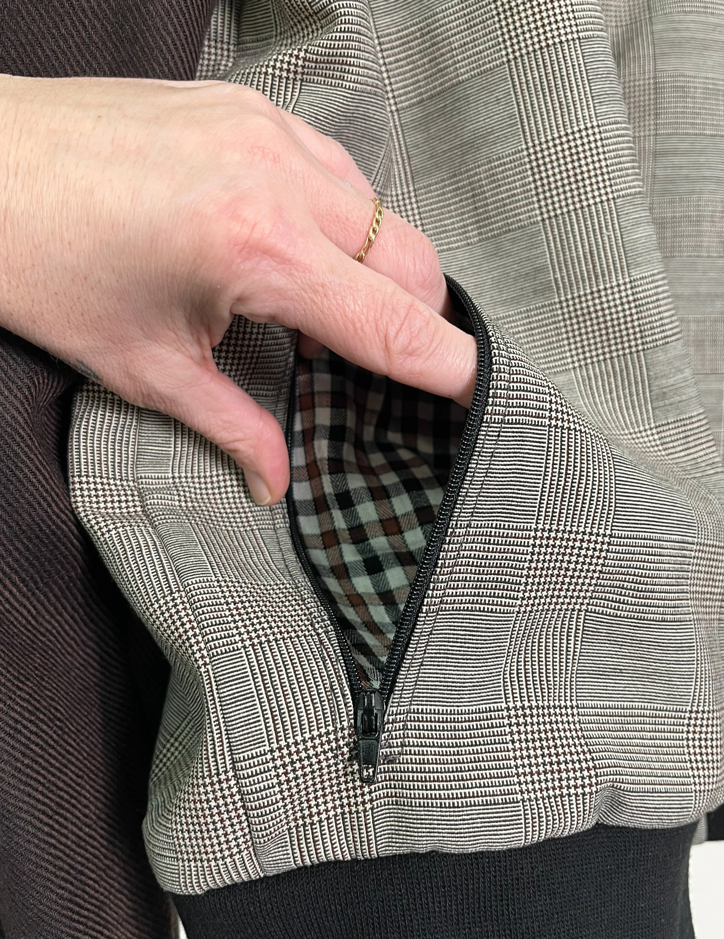 CipollaBomberJacket_ChocolatePlaid_PocketHand.jpg
