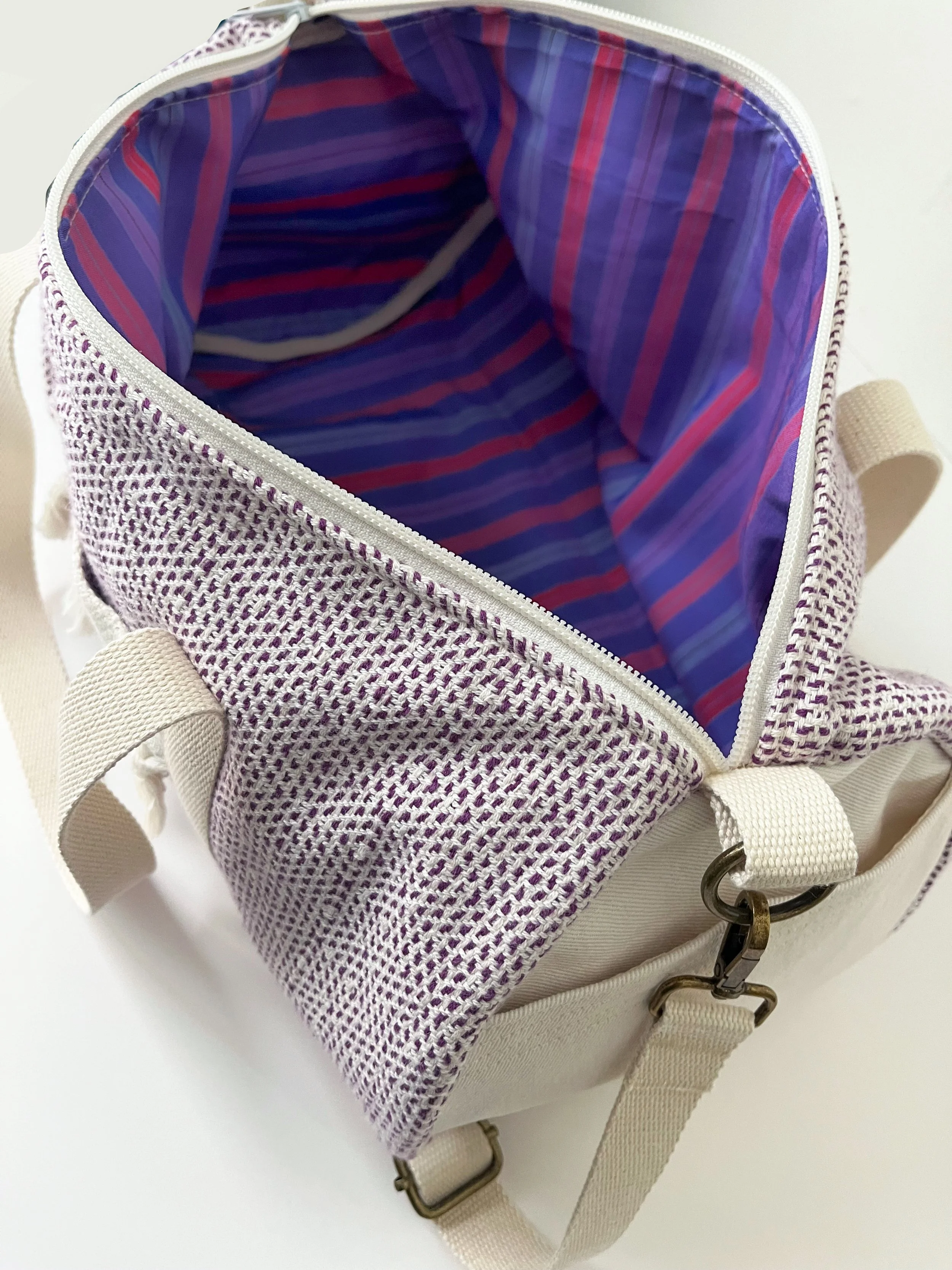 CipollaDuffleBag_CreamEggplant_Lining.jpg