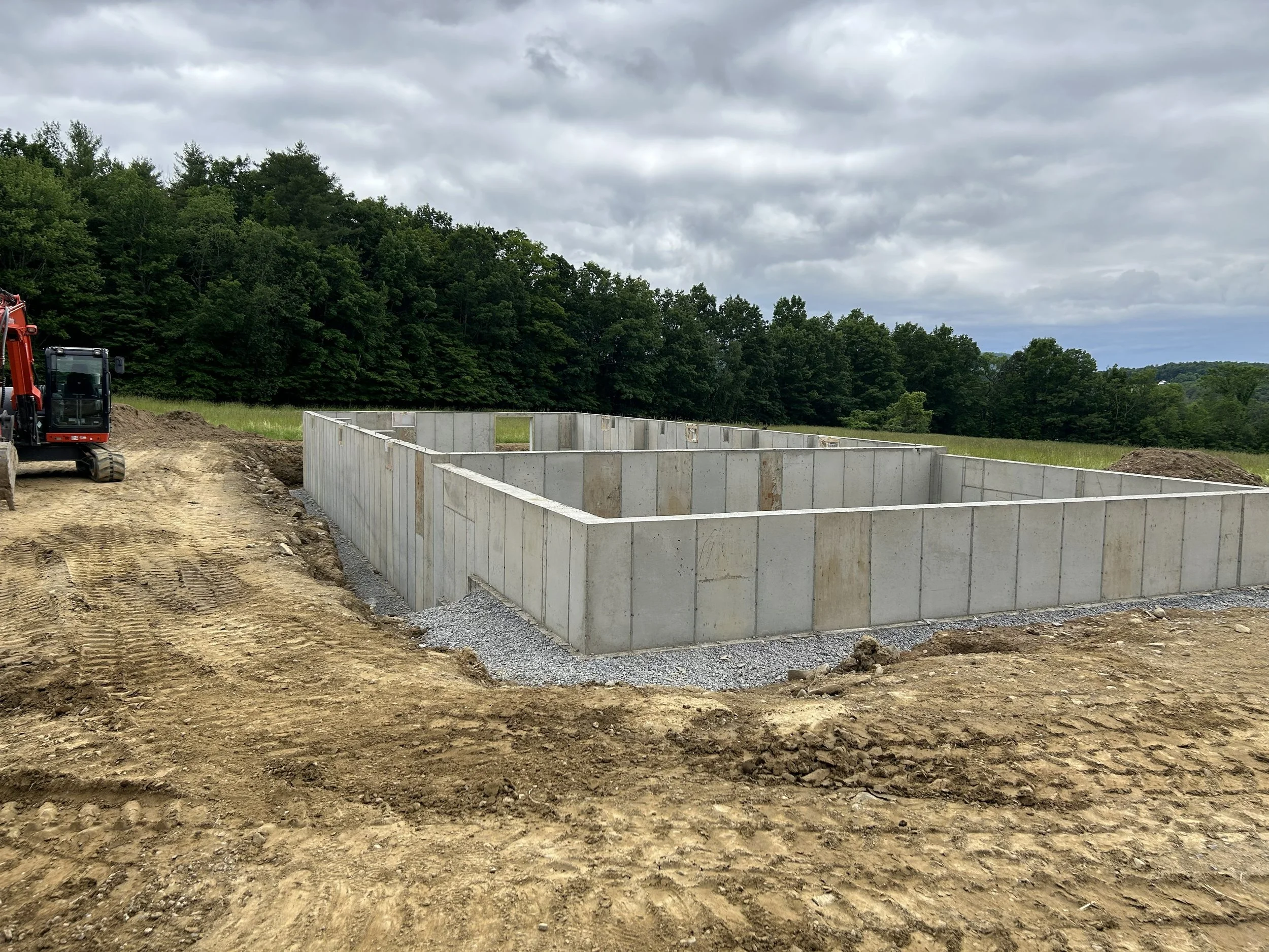 Construction site with concrete foundation walls 