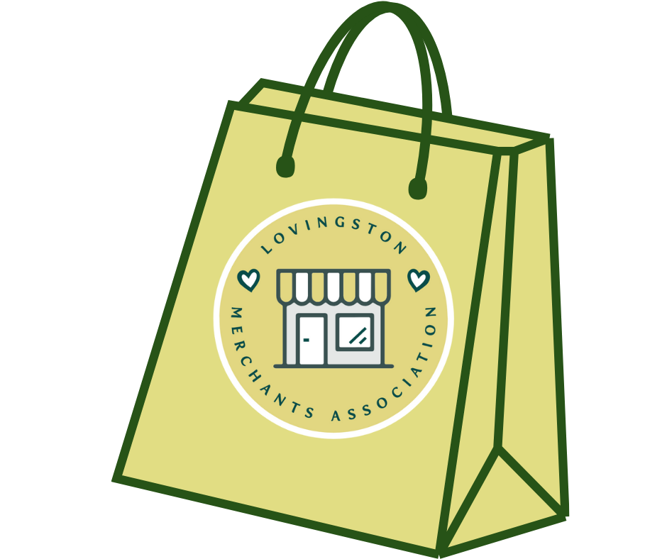 A green shopping bag with the logo of the Lownngston Merchants Association, featuring a storefront with an awning, enclosed in a circle with the organization's name.