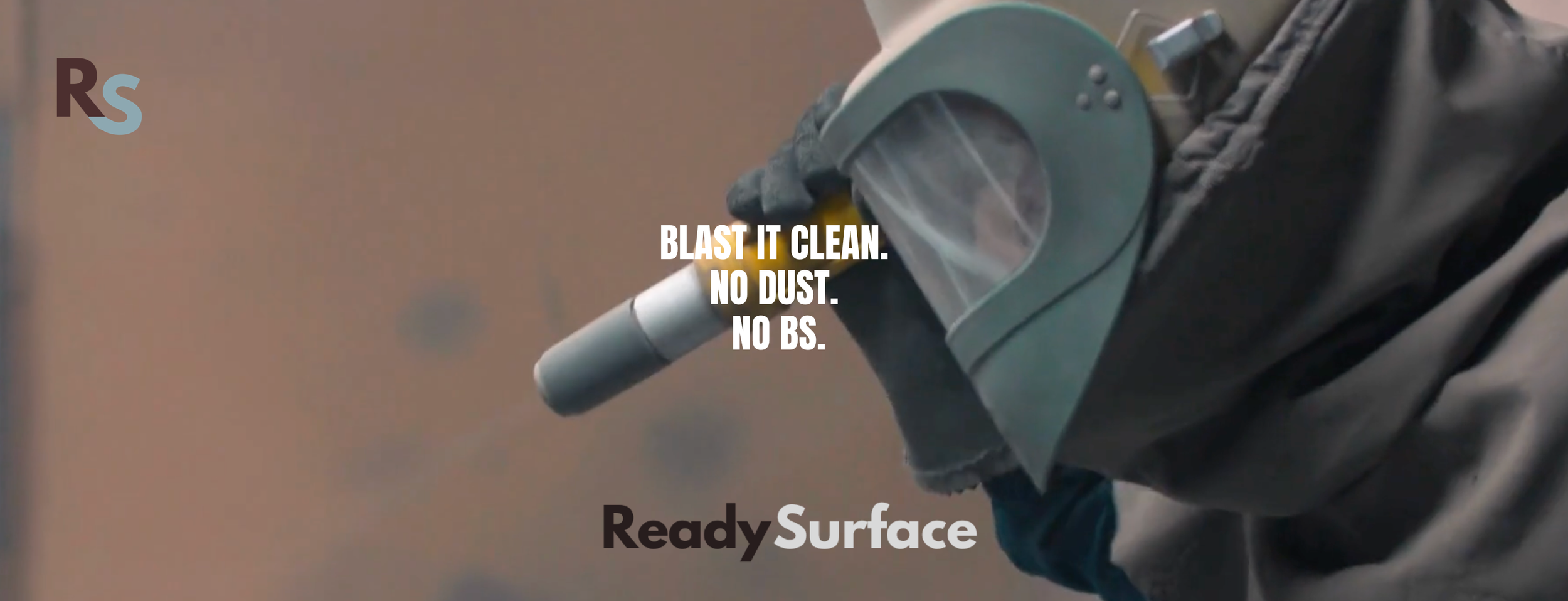 Close-up of a person holding a power tool, with overlay text that reads 'BLAST IT CLEAN. NO DUST. NO BS.' and the brand name 'ReadySurface' in the lower part of the image.
