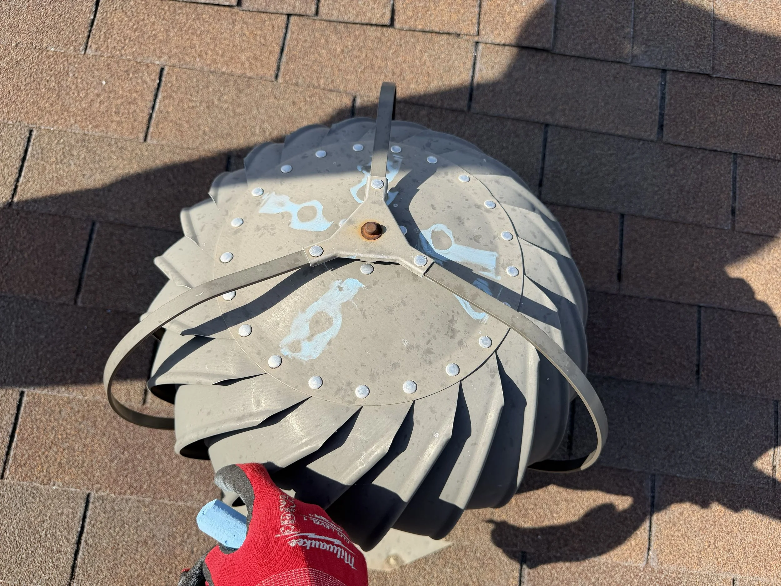 Hail damage to roofing vent.