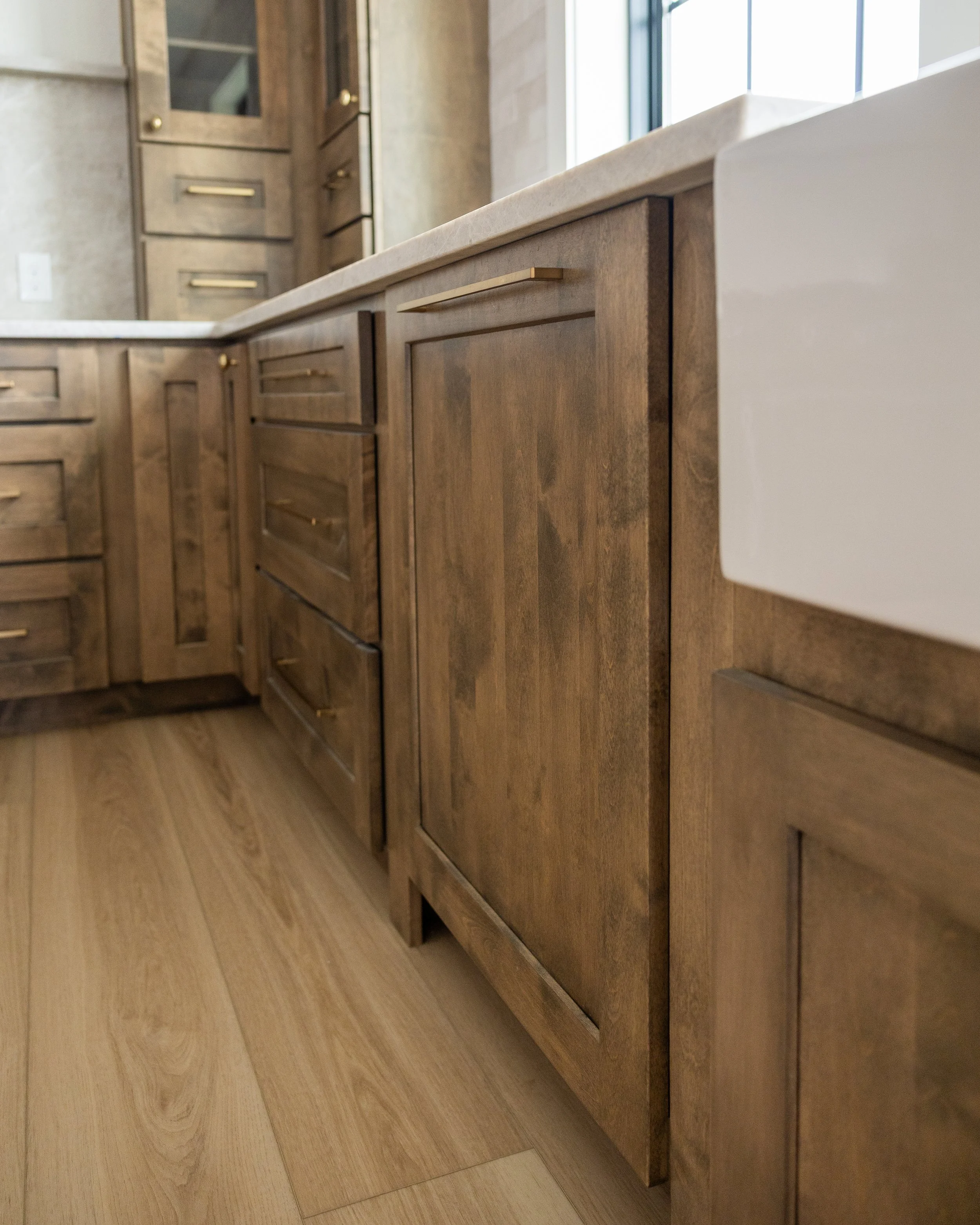 From the handcrafted cabinetry to the detailed finish work, every element of this kitchen was built with precision and care. The result is a beautiful, highly functional space that reflects our commitment to quality craftsmanship and lasting value.
K