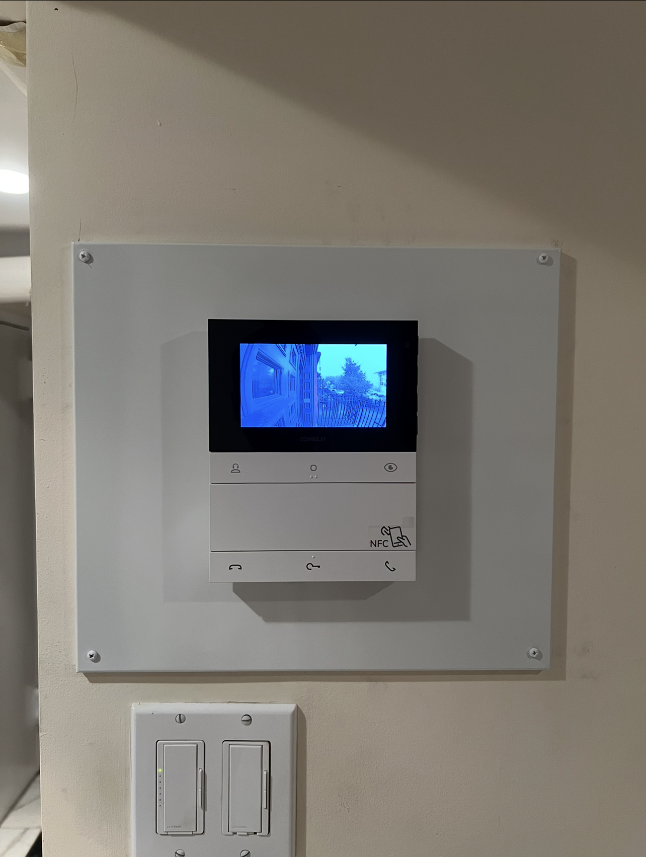 Interior video intercom monitor installed in NYC apartment building.