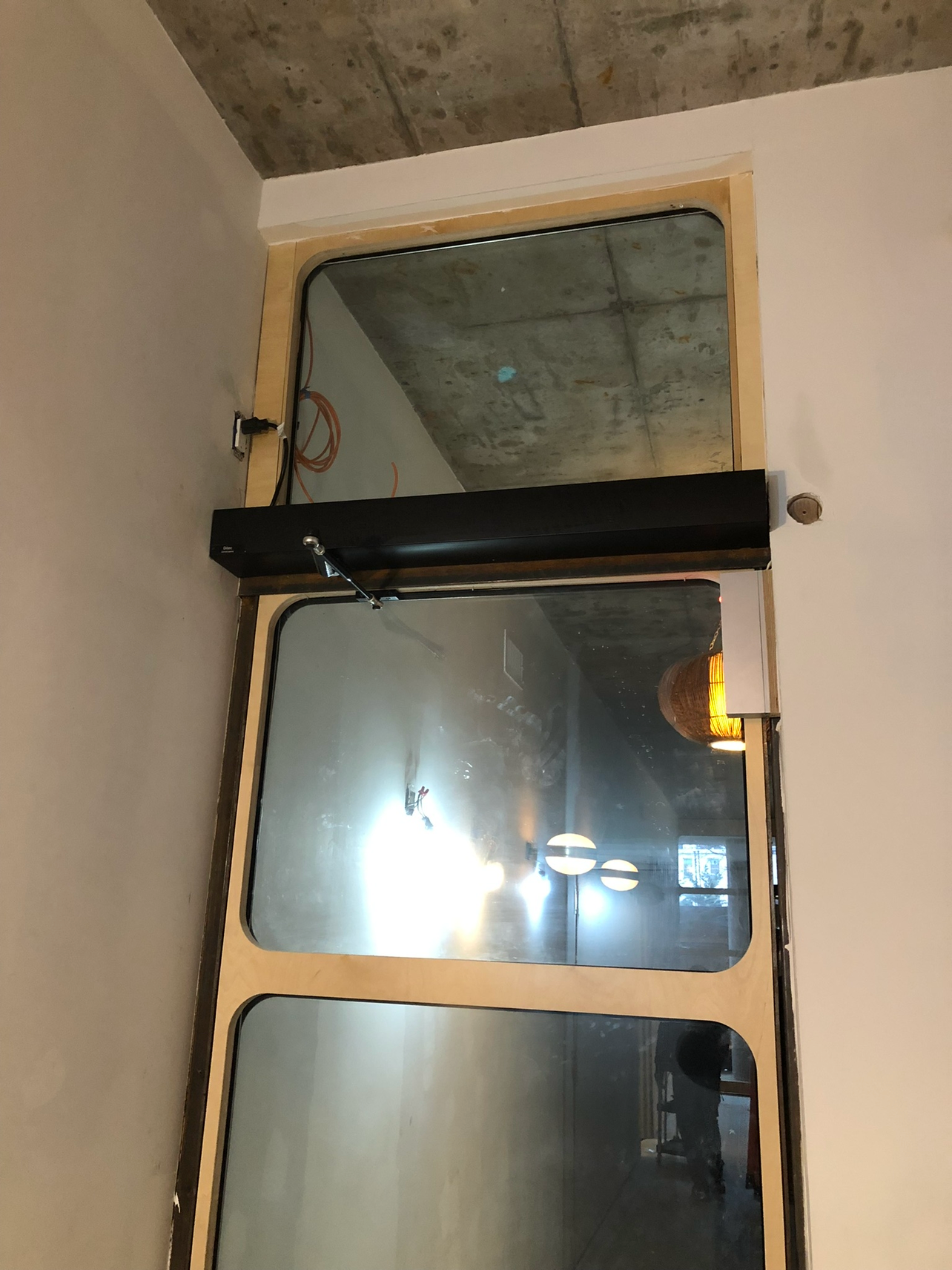 DITEC Automatic Door Operator. Providing hands-free, ADA-compliant building access, fully integrated with the building’s existing intercom and access systems.