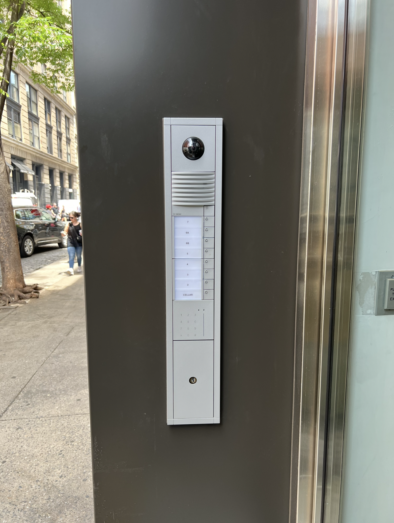 Access control keypad and intercom system installation for NYC building entrance.