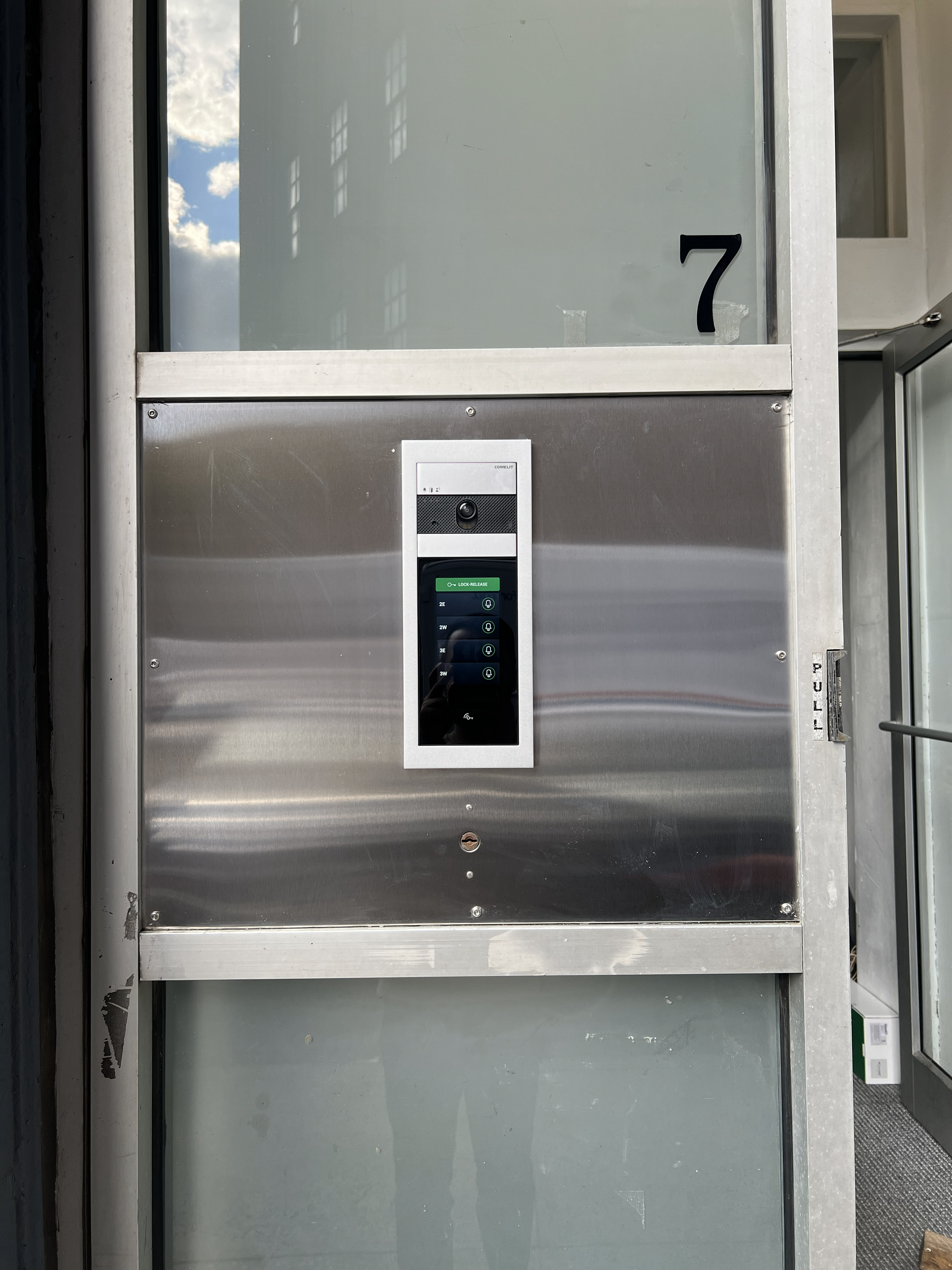 Comelit video intercom system installation for residential building entrance in Brooklyn, NYC.