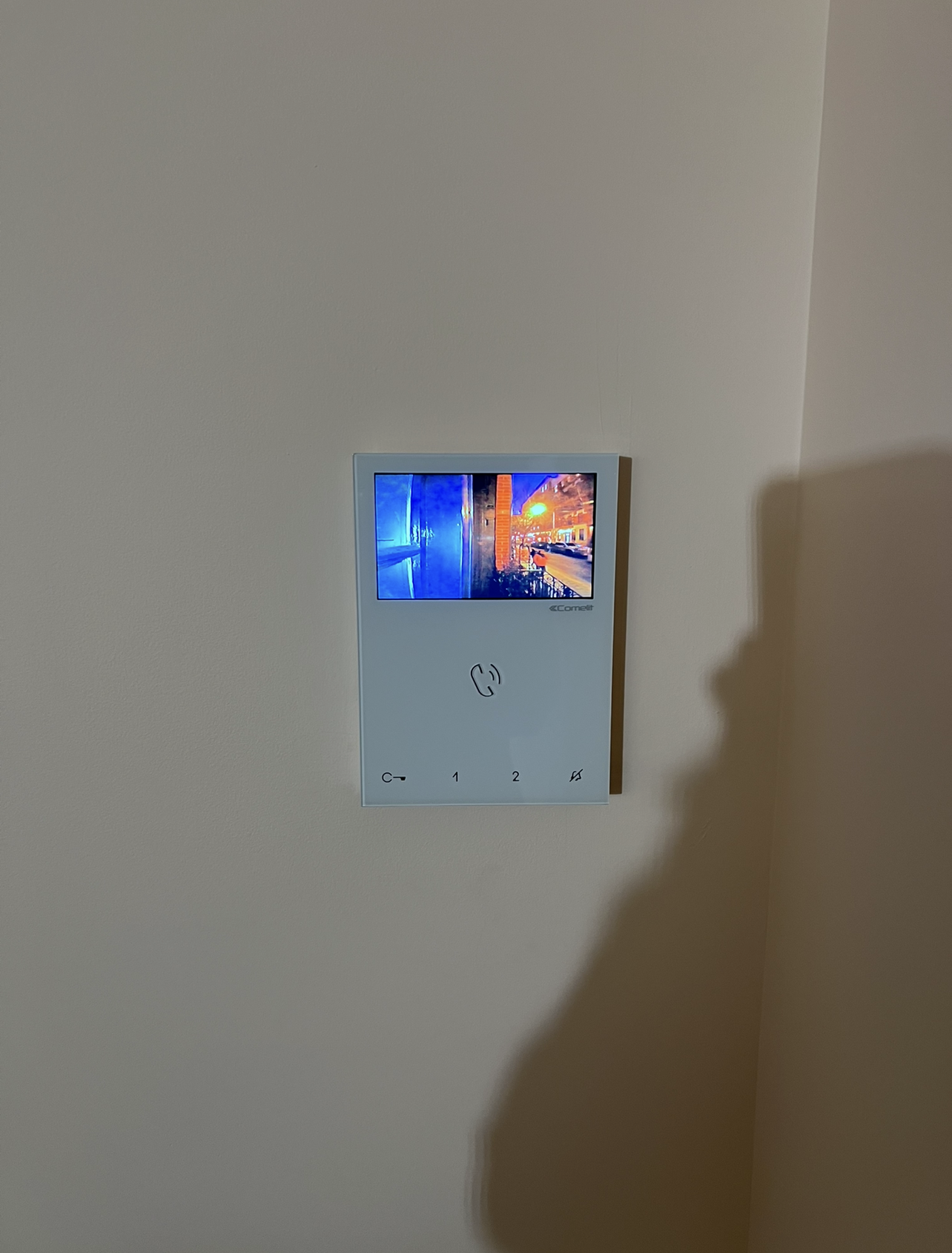 Comelit indoor intercom monitor installation for resident communication and access.