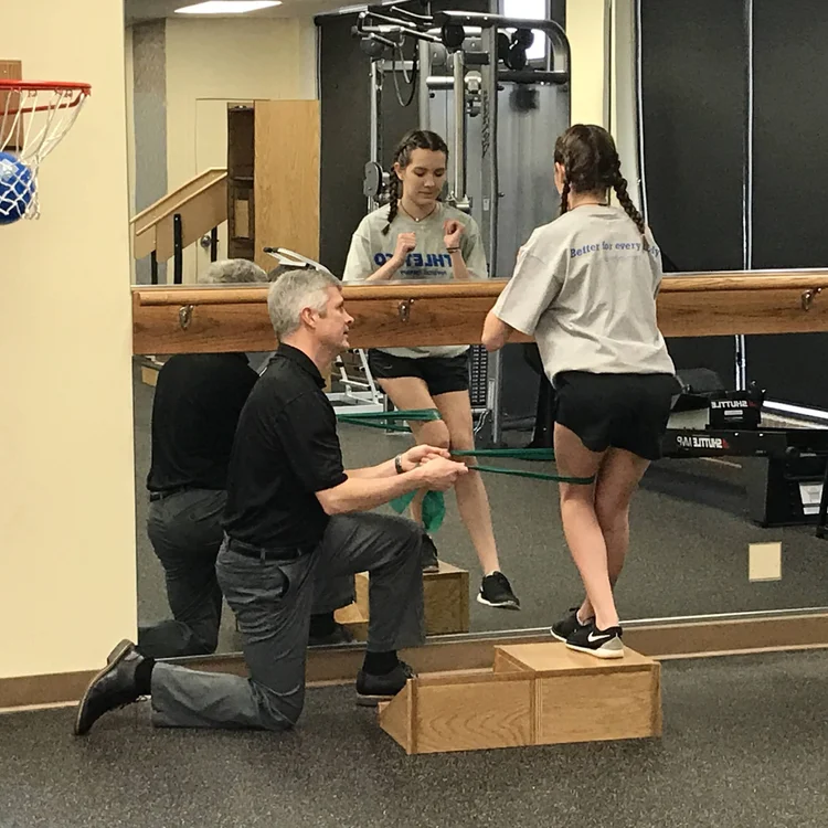 Jeff working with a patient at Athletico