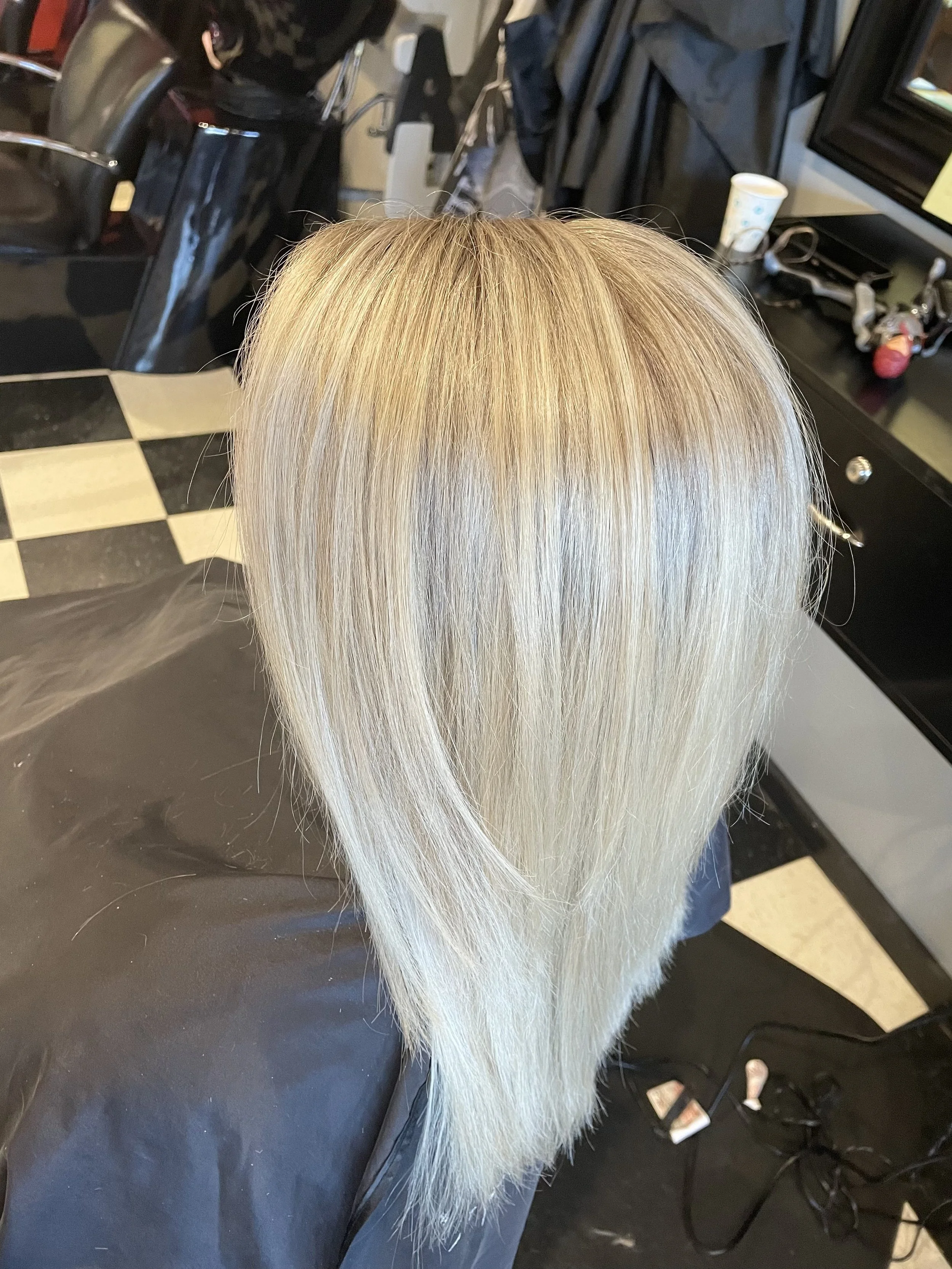 Icy blond medium length cut