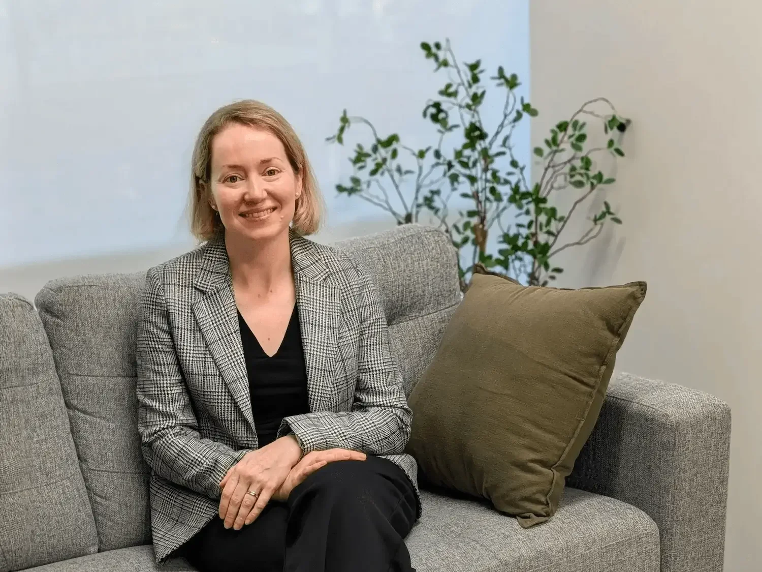 A photo of Dr. Charles smiling.