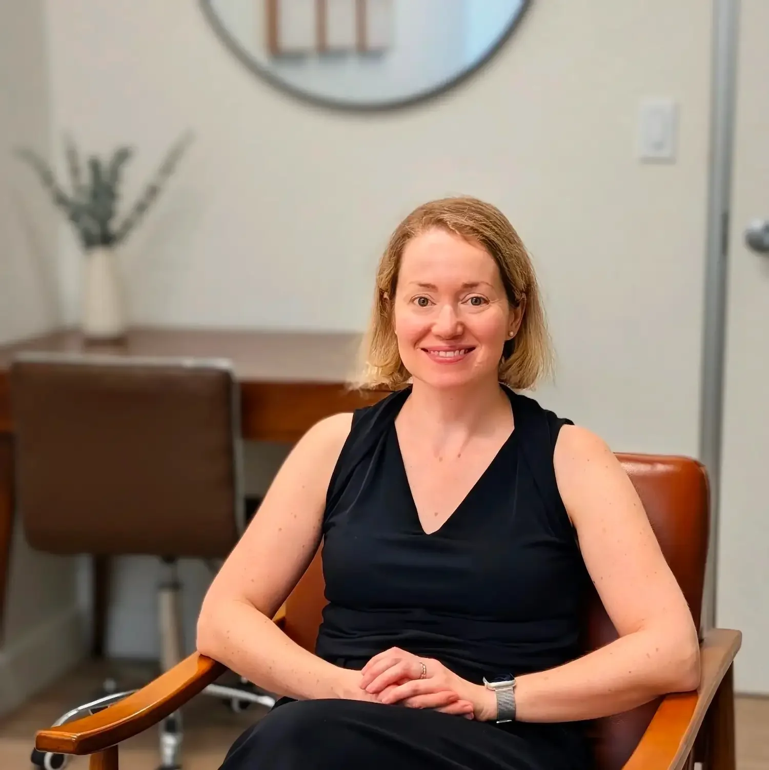 A photo of Dr. Charles smiling