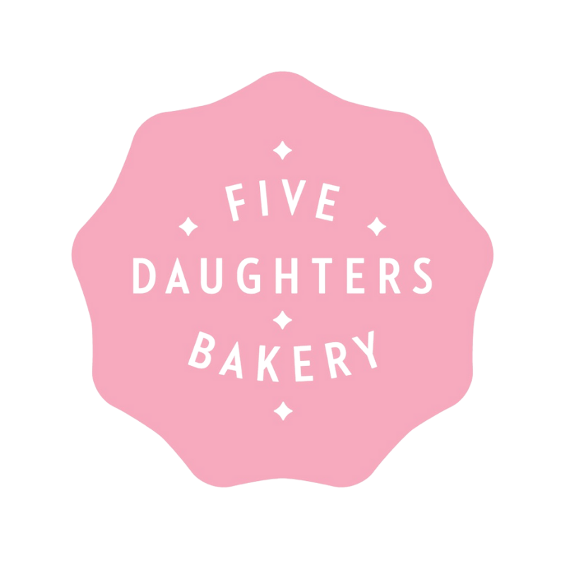 Pink bakery logo with the text 'Five Daughters Bakery' arranged in a circular pattern with small diamond shapes around the text.