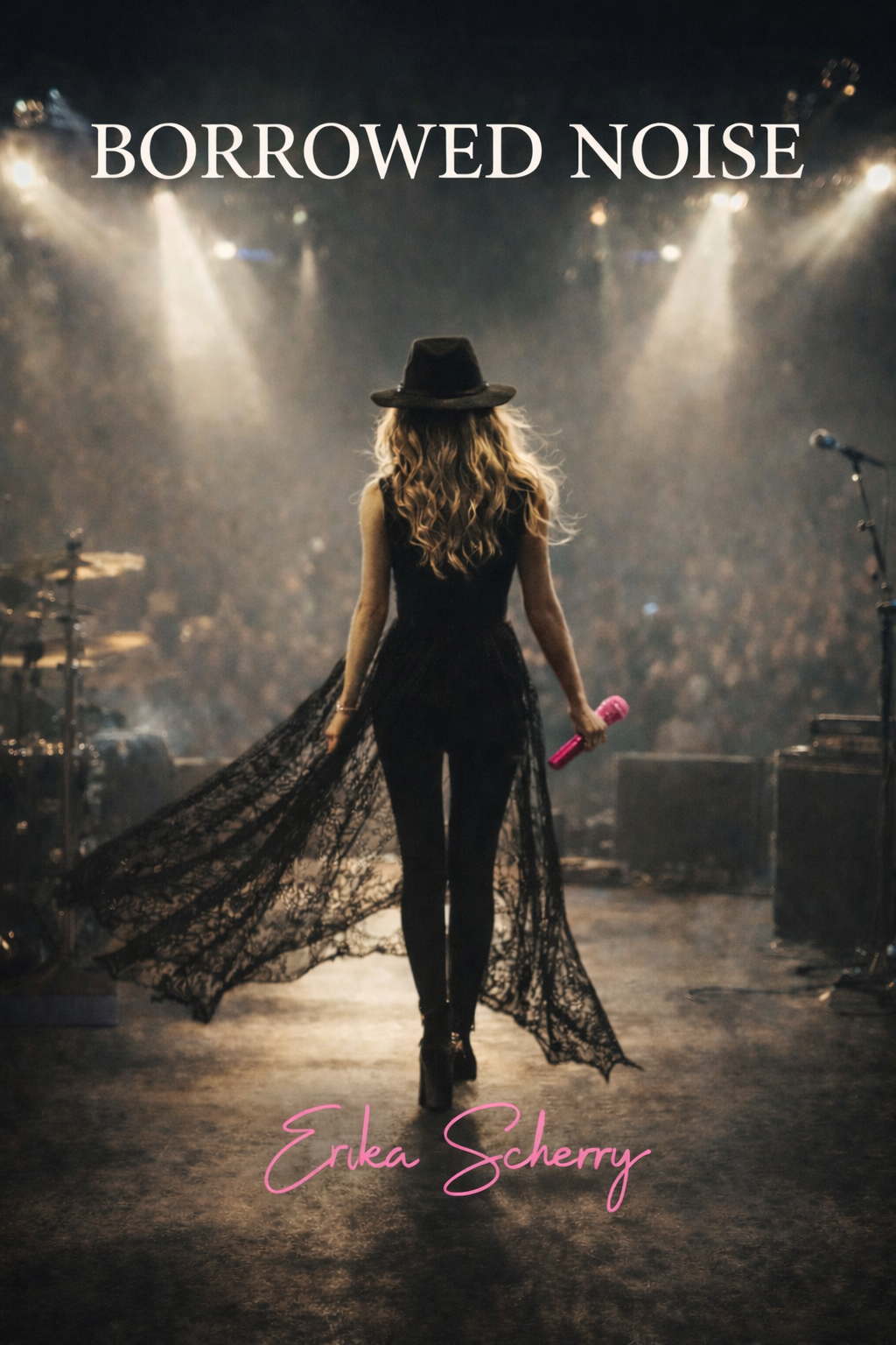 A female singer walking on stage backstage with a microphone in her right hand, wearing a black lace dress and a wide-brimmed hat, illuminated by stage lights, with musical equipment on stage and a blurred crowd in the background. The title "BORROWED NOISE" appears at the top, and the name "Erika Scherry" is written at the bottom.