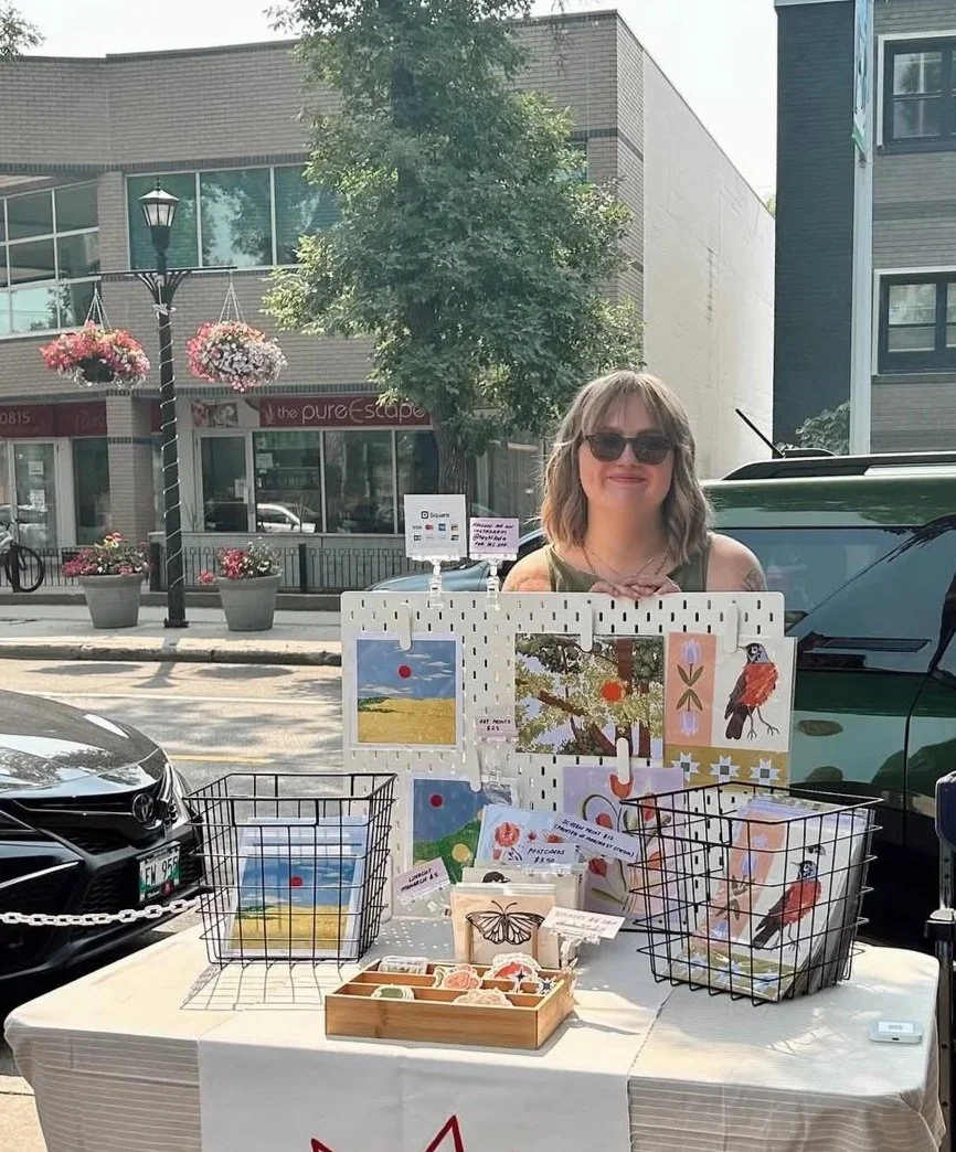 Kyla vending at an outdoor market