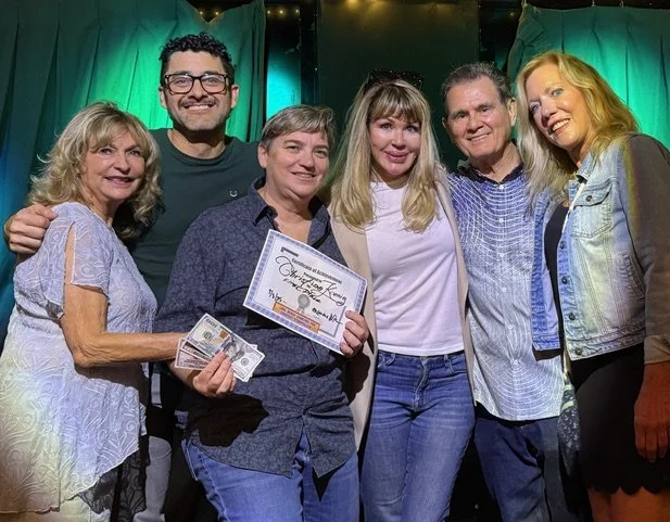 A Barstool, a Stranger, a Storyteller Win