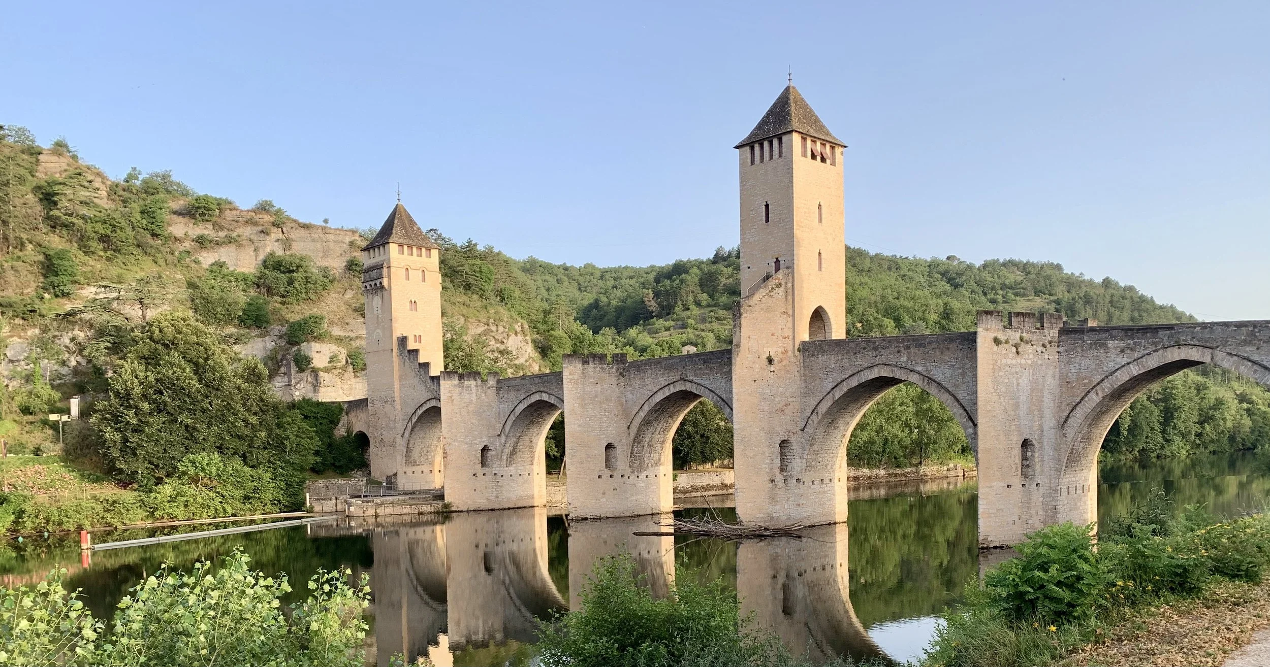 The historic Valentré bridge in Cahors on the Lot river an iconic stop on the Via Podiensis Camino