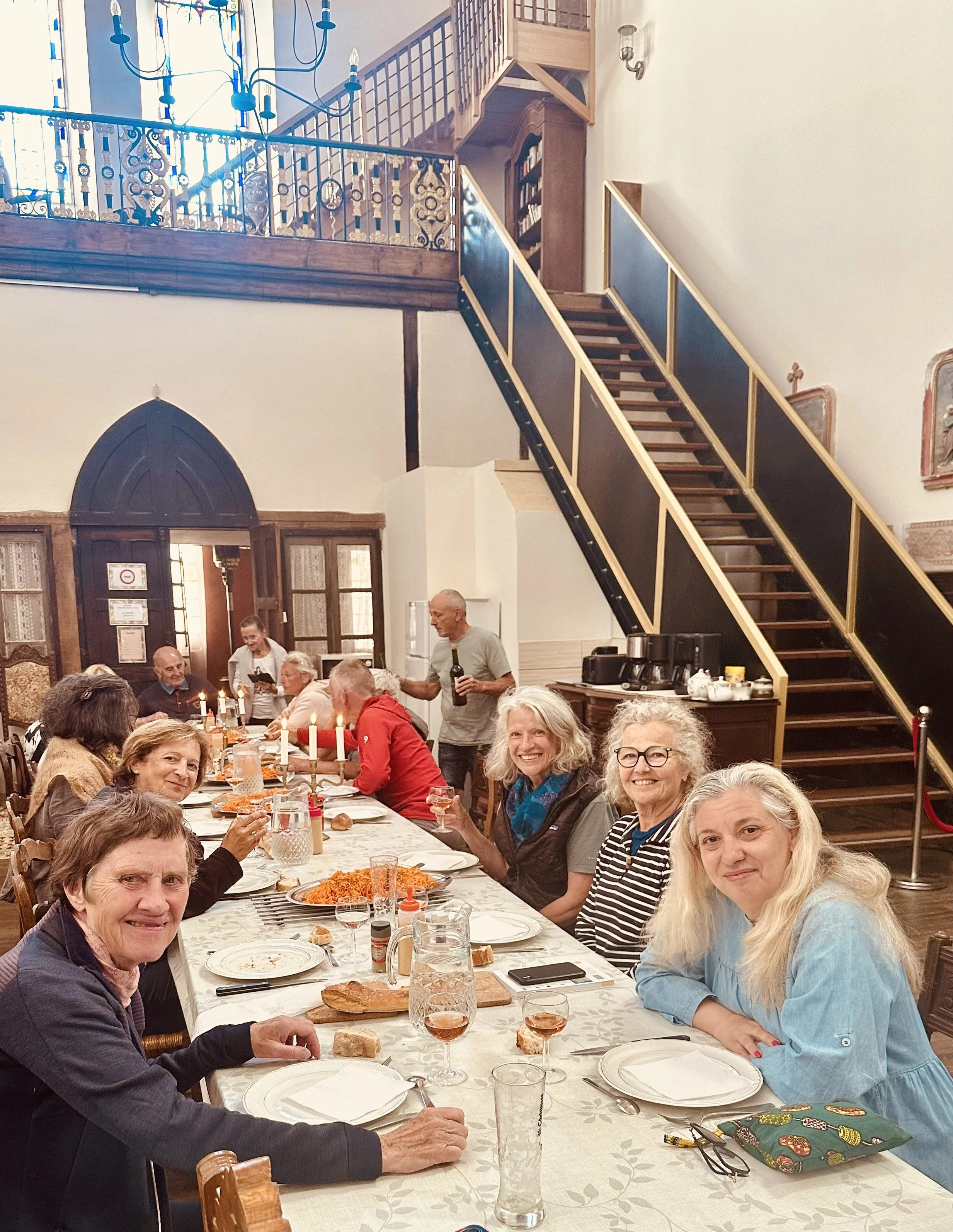 Women enjoying dinner around a table