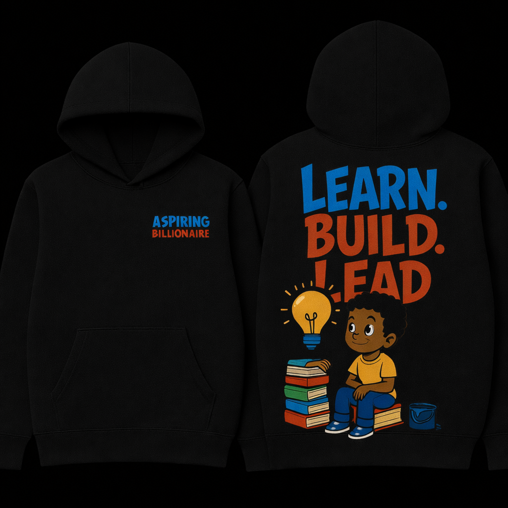 Black hooded sweatshirt with colorful text and graphics promoting learning and building. The front reads 'ASPIRING BILLIONAIRE' in blue and red, and the back features large blue and orange text saying 'LEARN. BUILD. LEAD' with a cartoon of a boy sitting on a stack of books next to a light bulb and a bucket.