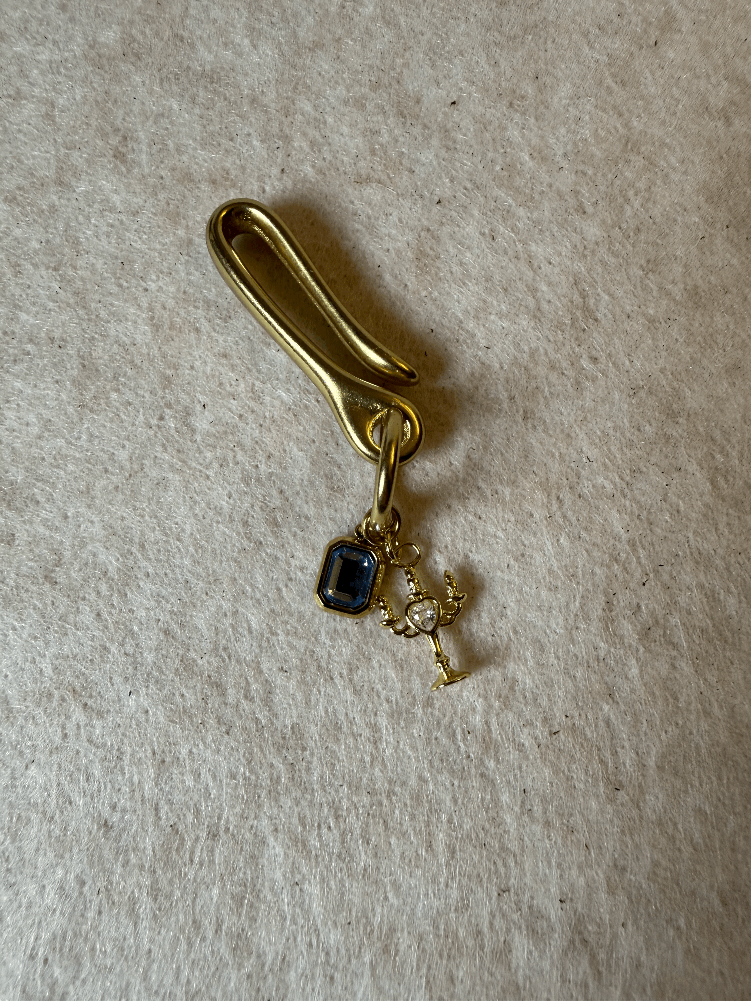 Held Charm Clasp