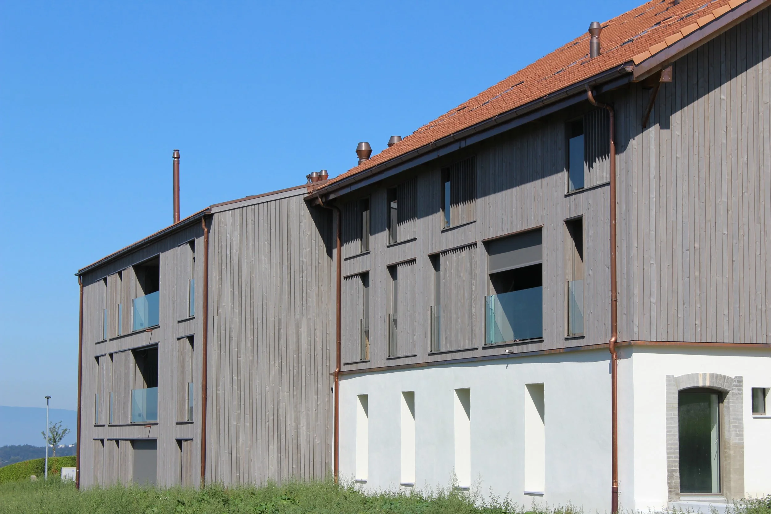 Domaine du Ru à Arconciel, ancien rural transformé et agrandi pour la création de logements