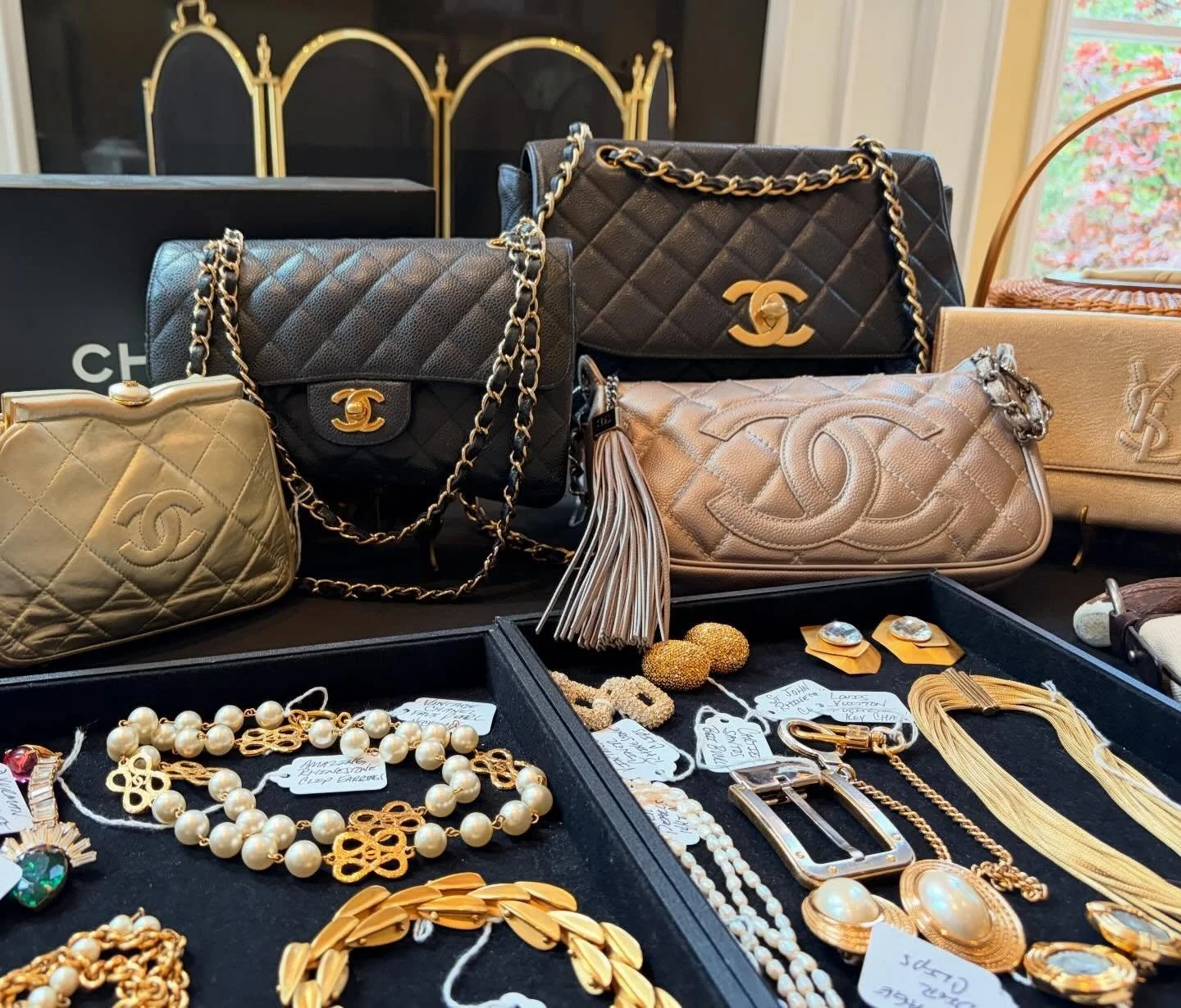 Still in the processing stage, but wanted to share the progress 🏡 Frontenac estate sale coming soon. Chanel, YSL, fine jewelry , Baccarat, Waterford, Armani, Ralph Lauren, Antiques, Hermes, Artwork, Mackenzie Childs, Collectibles + more 💚