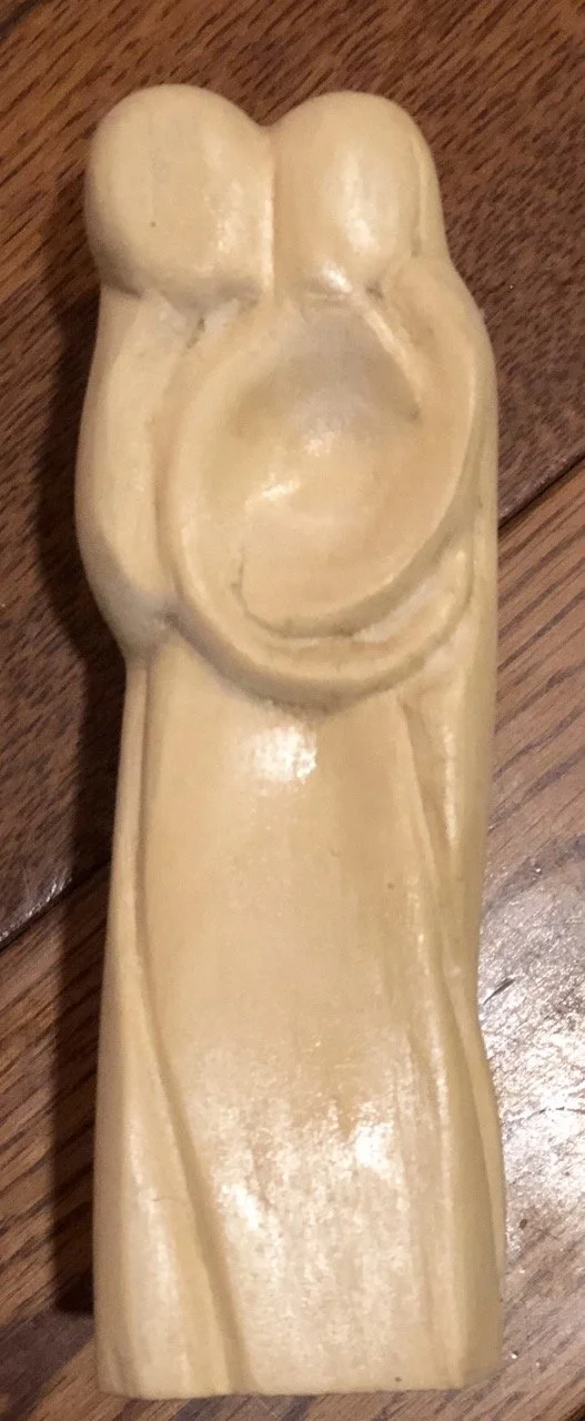 A wooden carving made by hand.