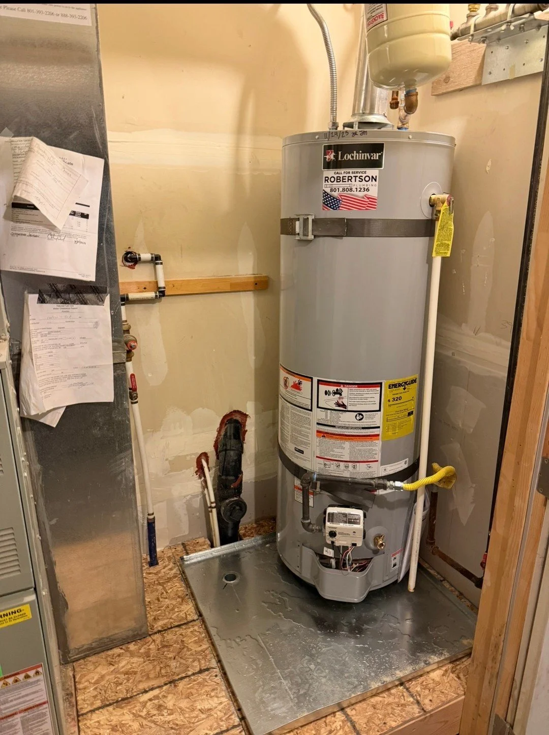 Drain pan in place, then the heater with its piping, expansion tank, and gas line tied in. Clean, straightforward layout in the utility room so everything is easy to reach down the road.

Please call/text 801-808-1236 to make an appointment

#robert