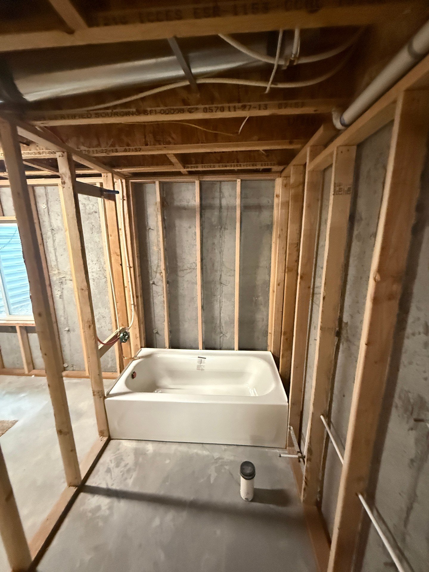 New construction rough-in for this tub and shower is wrapped up. PVC drain is in, supplies are routed through the studs, and you can see the vent lines overhead. Tub&rsquo;s set and we&rsquo;ll come back for faucet and trim once the walls are ready. 