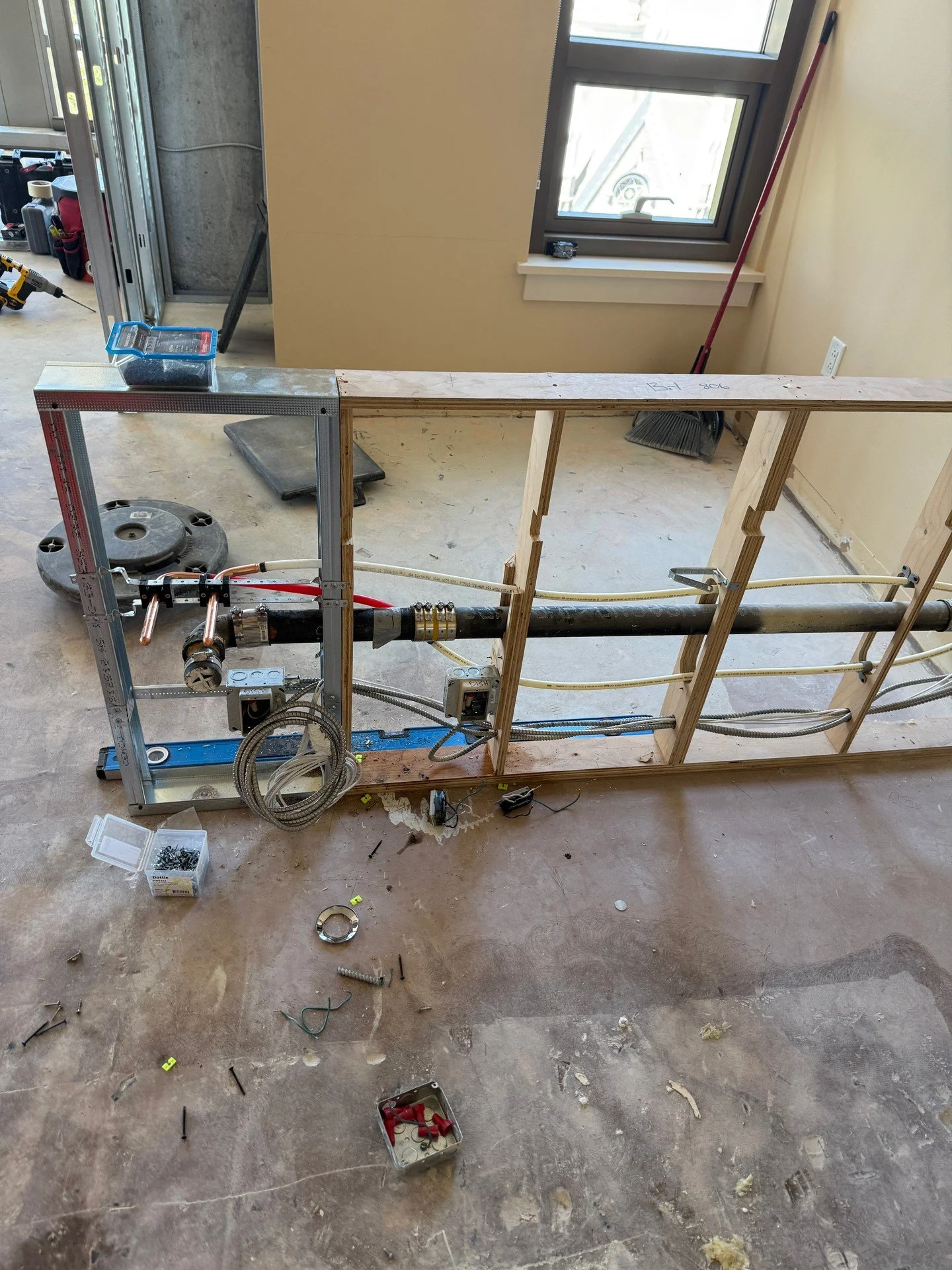 Wrapped up a clean rough-in today - copper and PEX set on the studs, strapped and spaced for the fixtures. Water lines are routed clean and securely fastened, staying clear of the framing. Electrical boxes and conduit are in, so each trade has a clea