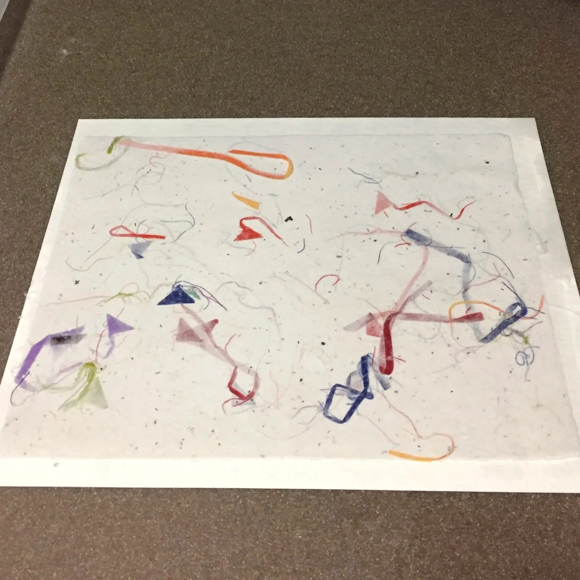 start with some fabric and thread trimmings  and throw them into the paper mulch 